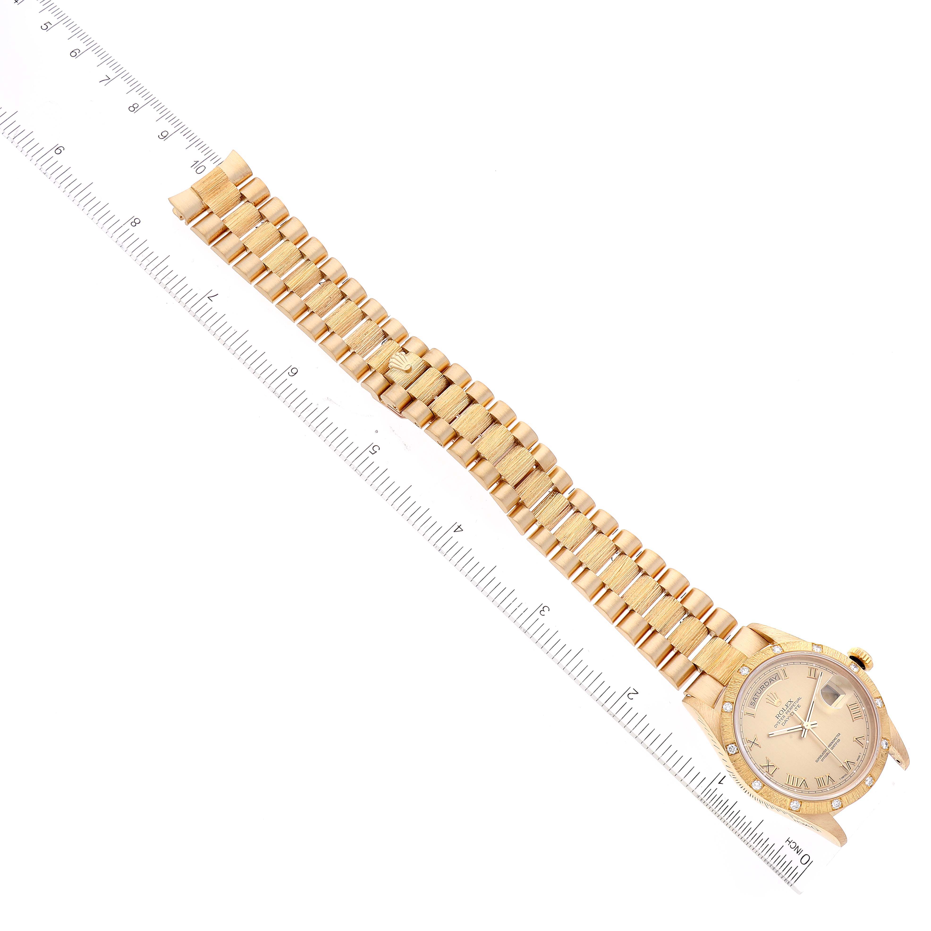 The image shows a Rolex President 18308 Men
s Yellow Gold Champagne Dial 18308 Men
s Yellow Gold Champagne Dial model watch laying flat, displaying its bezel, dial, and full bracelet alongside a ruler for scale.