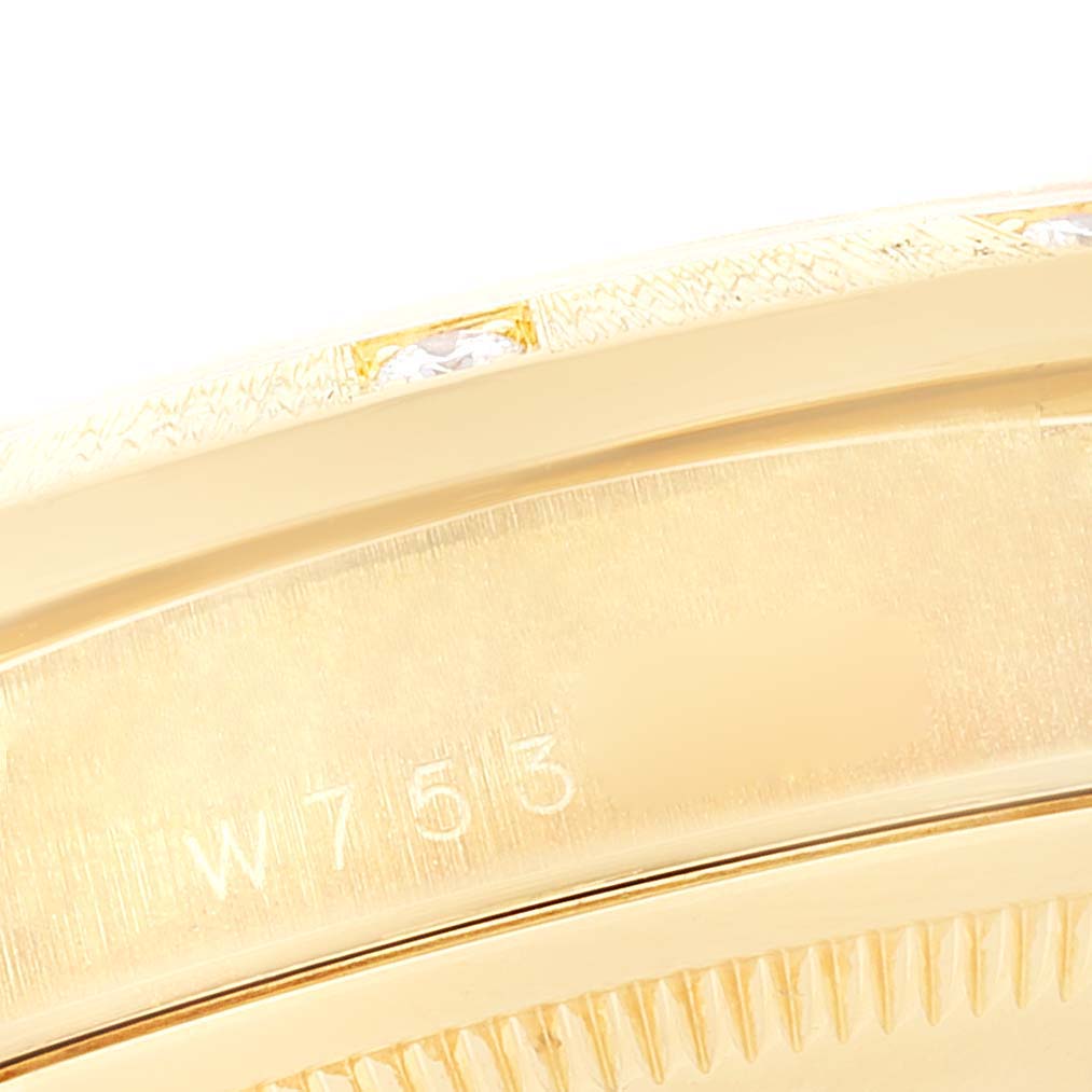 This image shows a close-up of the side of a Rolex President 18308 Men
s Yellow Gold Champagne Dial 18308 Men
s Yellow Gold Champagne Dial model watch with part of the serial number visible.