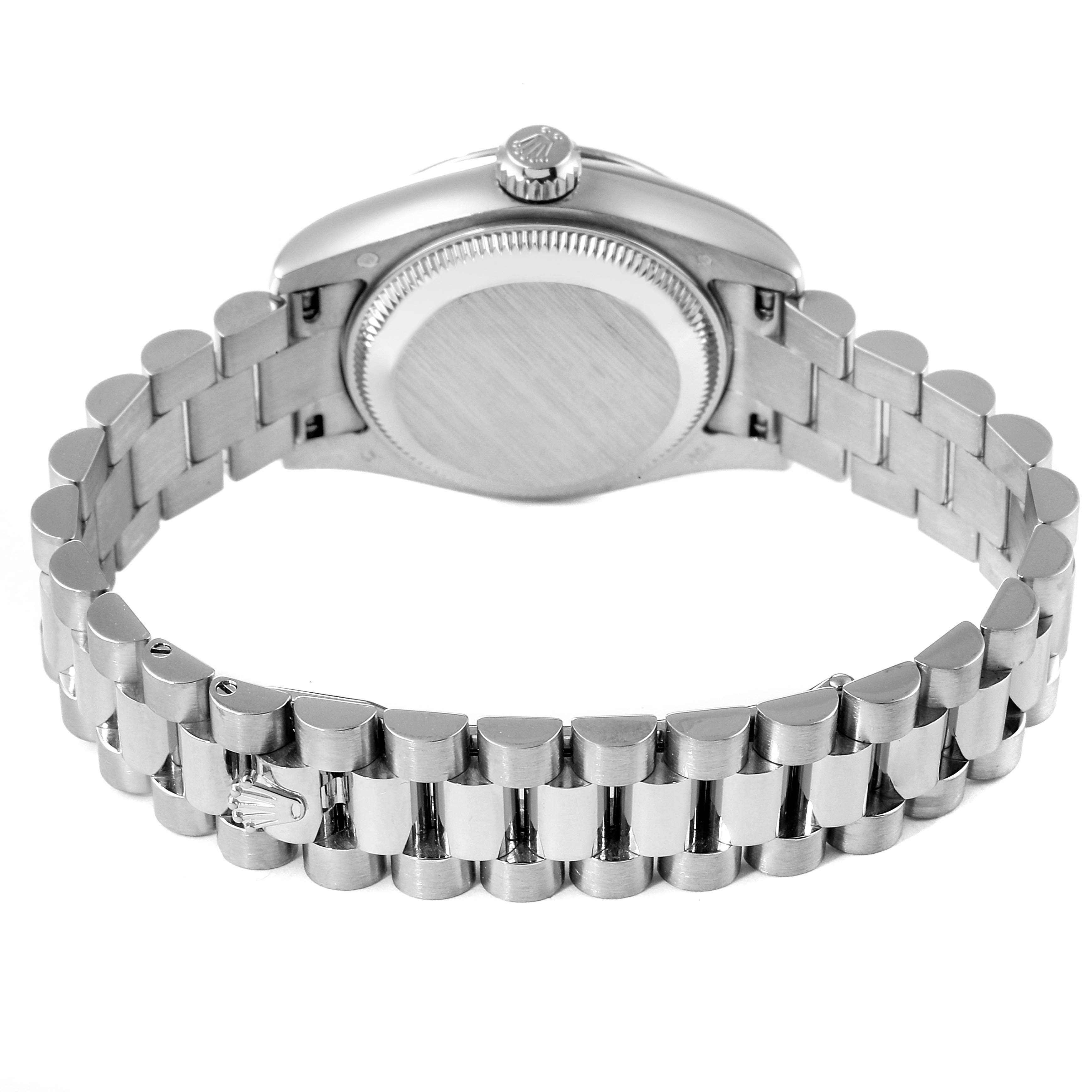 The image shows the back view of a Rolex President 179179 Women's White Gold Silver Dial 179179 Women's White Gold Silver Dial model watch, highlighting its case back and metal bracelet.