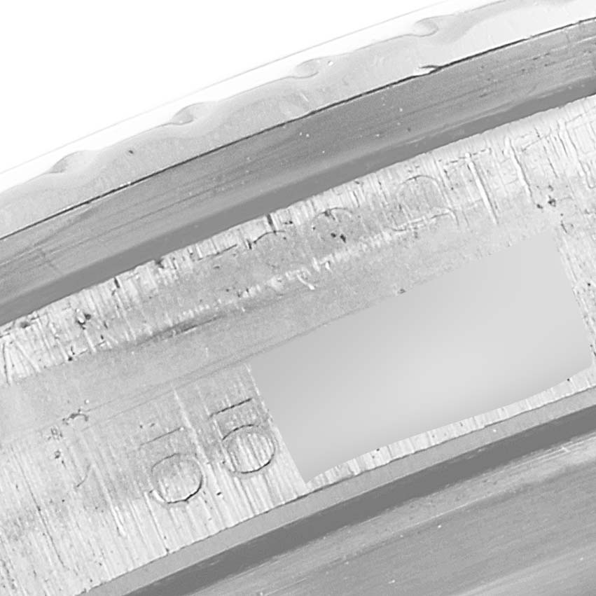 This image shows a close-up of the serial number engraving on a Rolex Vintage Collection 5513 Men's Stainless Steel Black Dial 5513 Men's Stainless Steel Black Dial watch.