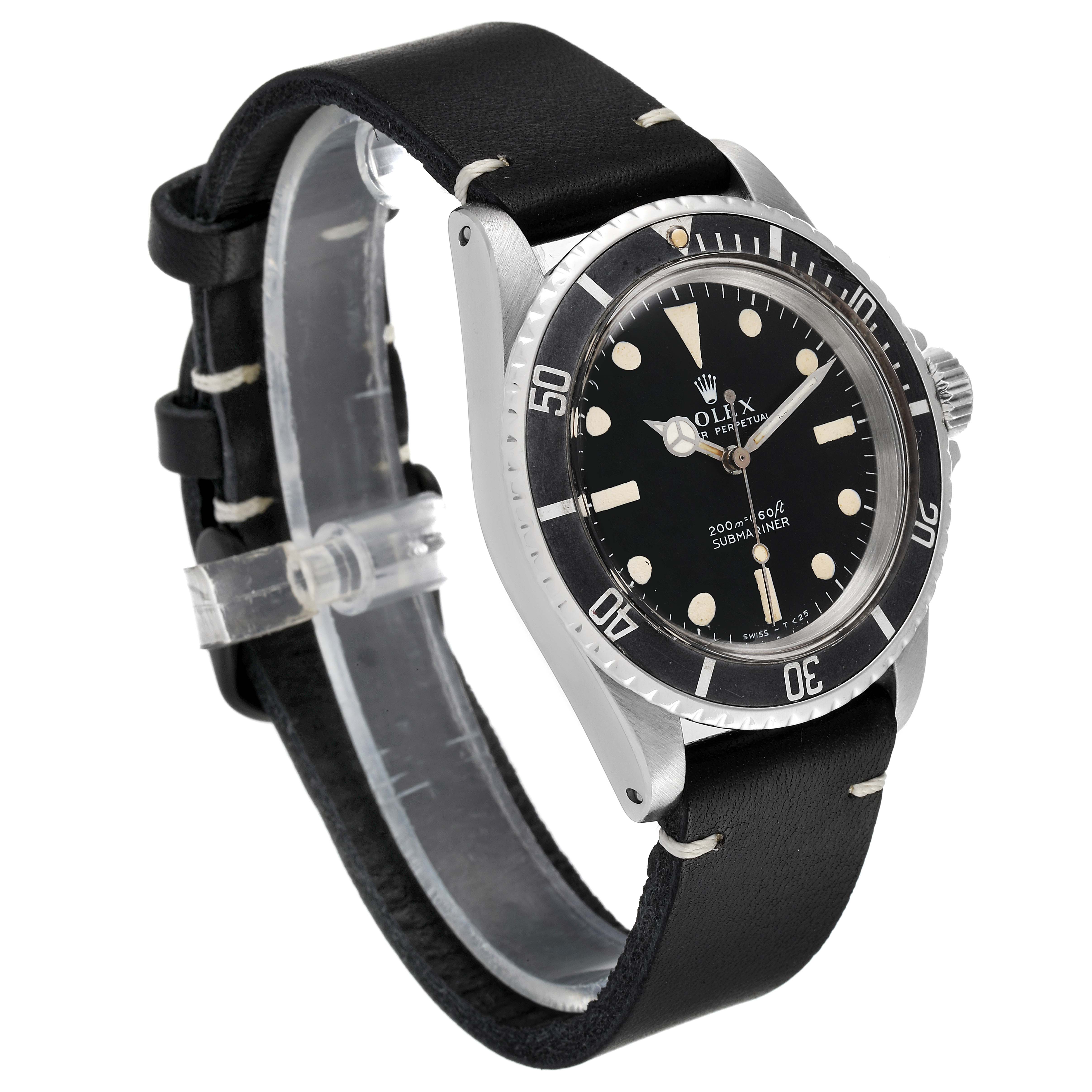 The image shows a Vintage Collection Rolex watch at a slight angle, highlighting the face, bezel, crown, and leather strap.