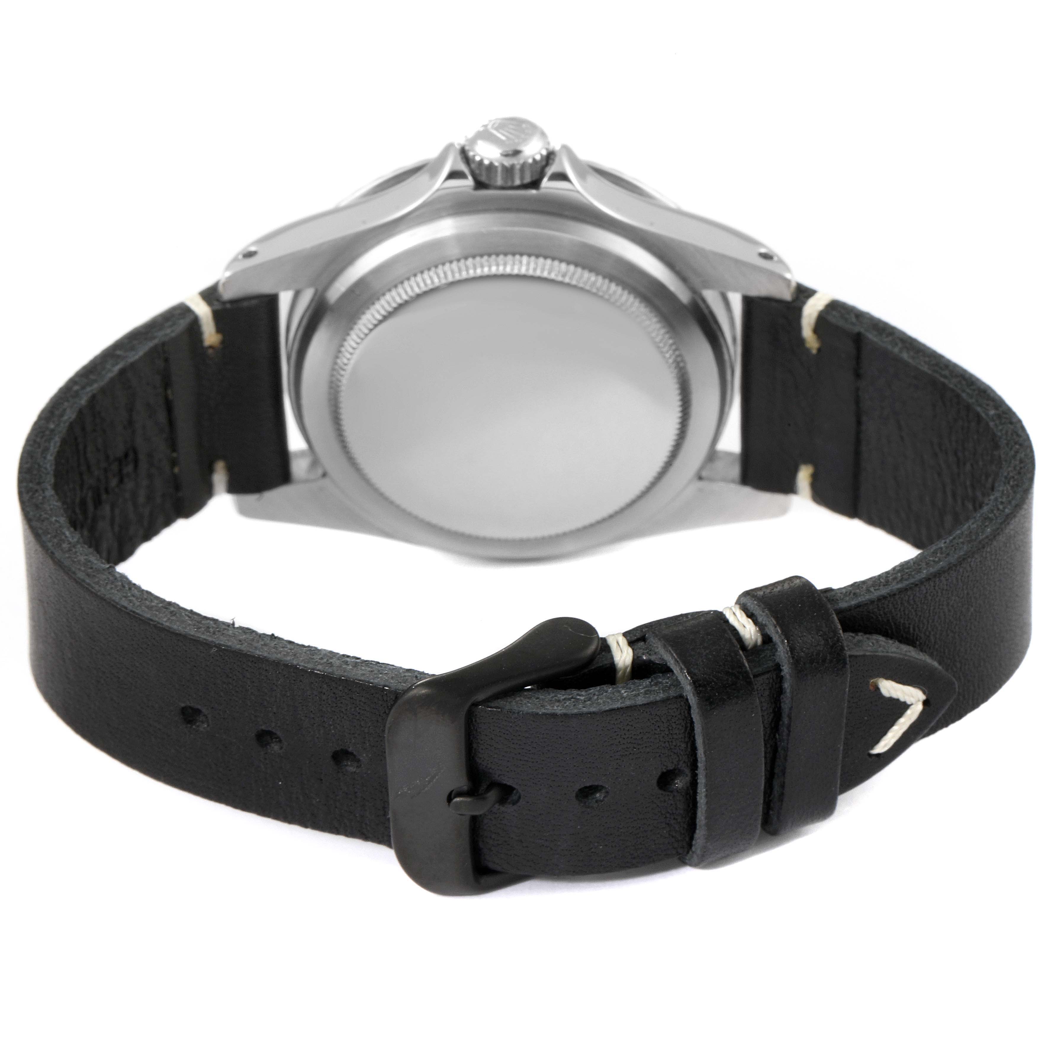 The image shows the back view of the Rolex Vintage Collection 5513 Men's Stainless Steel Black Dial 5513 Men's Stainless Steel Black Dial watch, highlighting the leather strap and clasp.