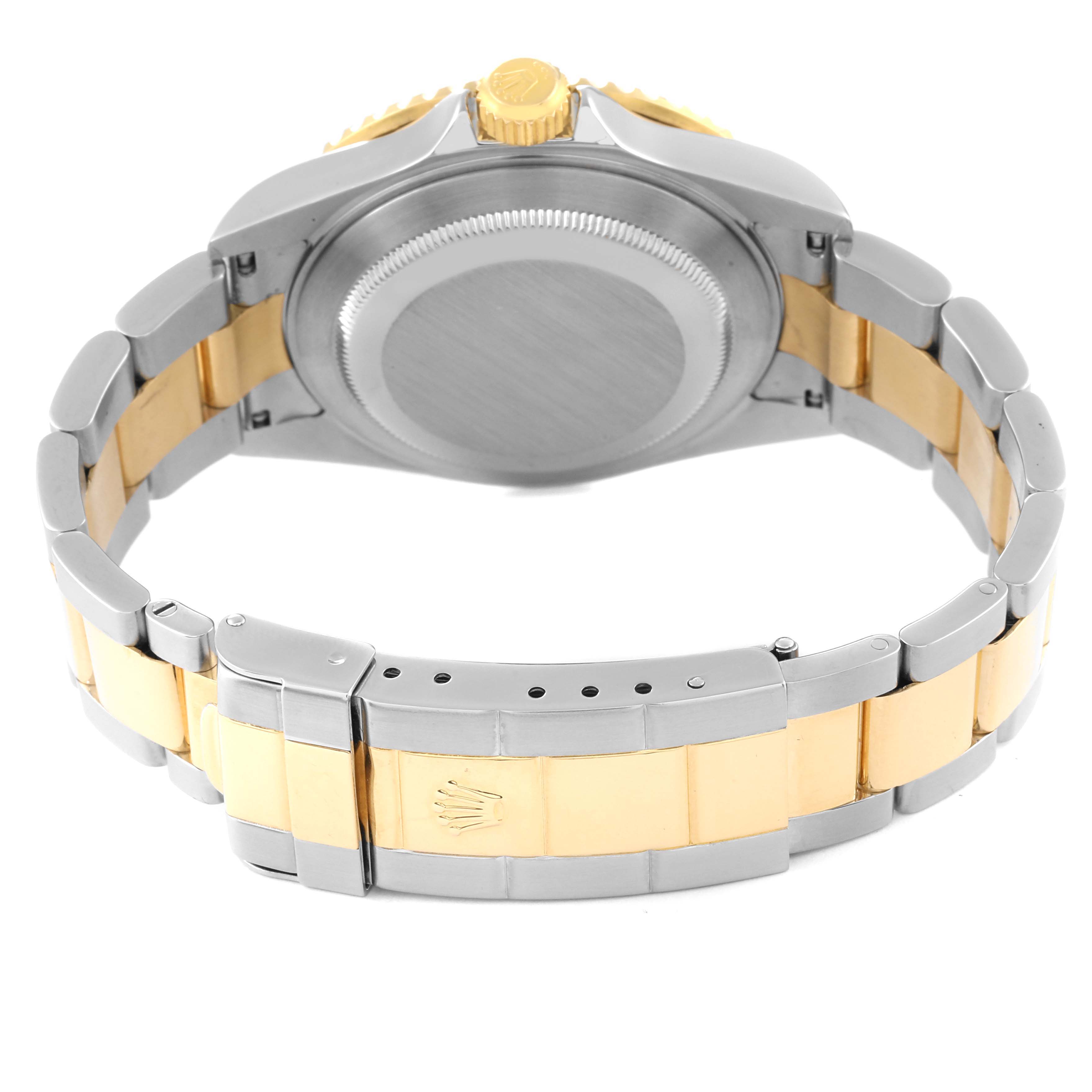 This image shows the back view of a Rolex Submariner 16613 Men
s Stainless Steel Blue Dial 16613 Men
s Stainless Steel Blue Dial watch, highlighting the case, crown, and bi-metal bracelet with a clasp.