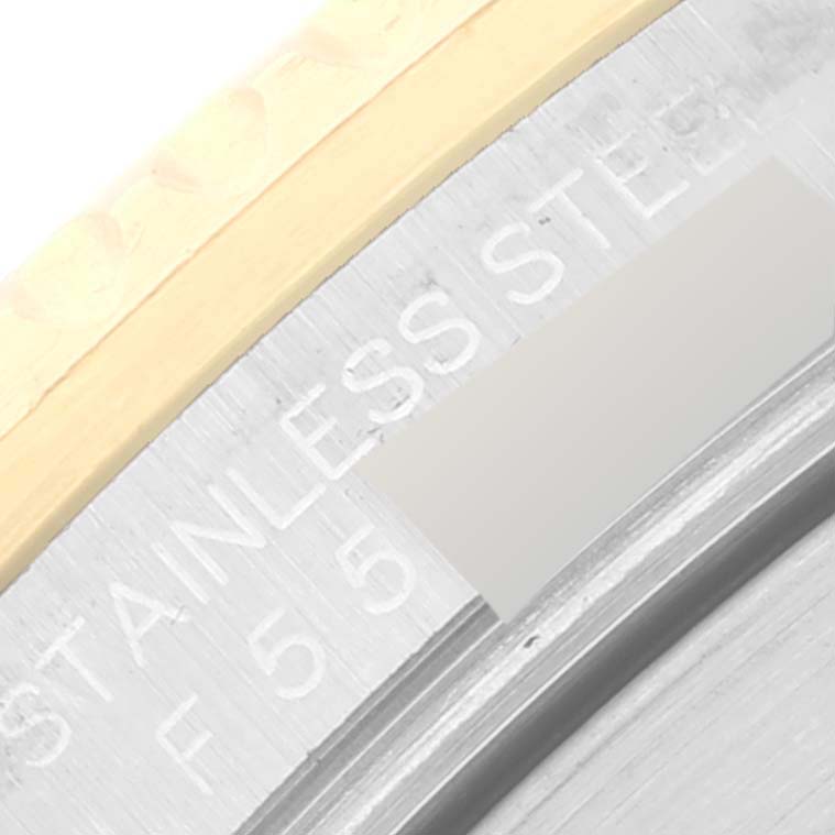 The image shows a close-up of the stainless steel casing and bezel of a Rolex Submariner 16613 Men
s Stainless Steel Blue Dial 16613 Men
s Stainless Steel Blue Dial watch.