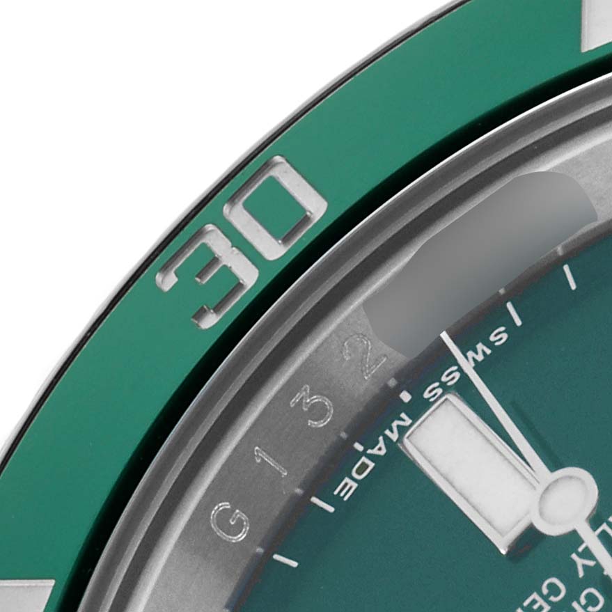 The image shows a close-up of the green bezel and dial edge of a Rolex Submariner 116610LV Men
s Stainless Steel Green Dial watch displaying the "30" marker.
