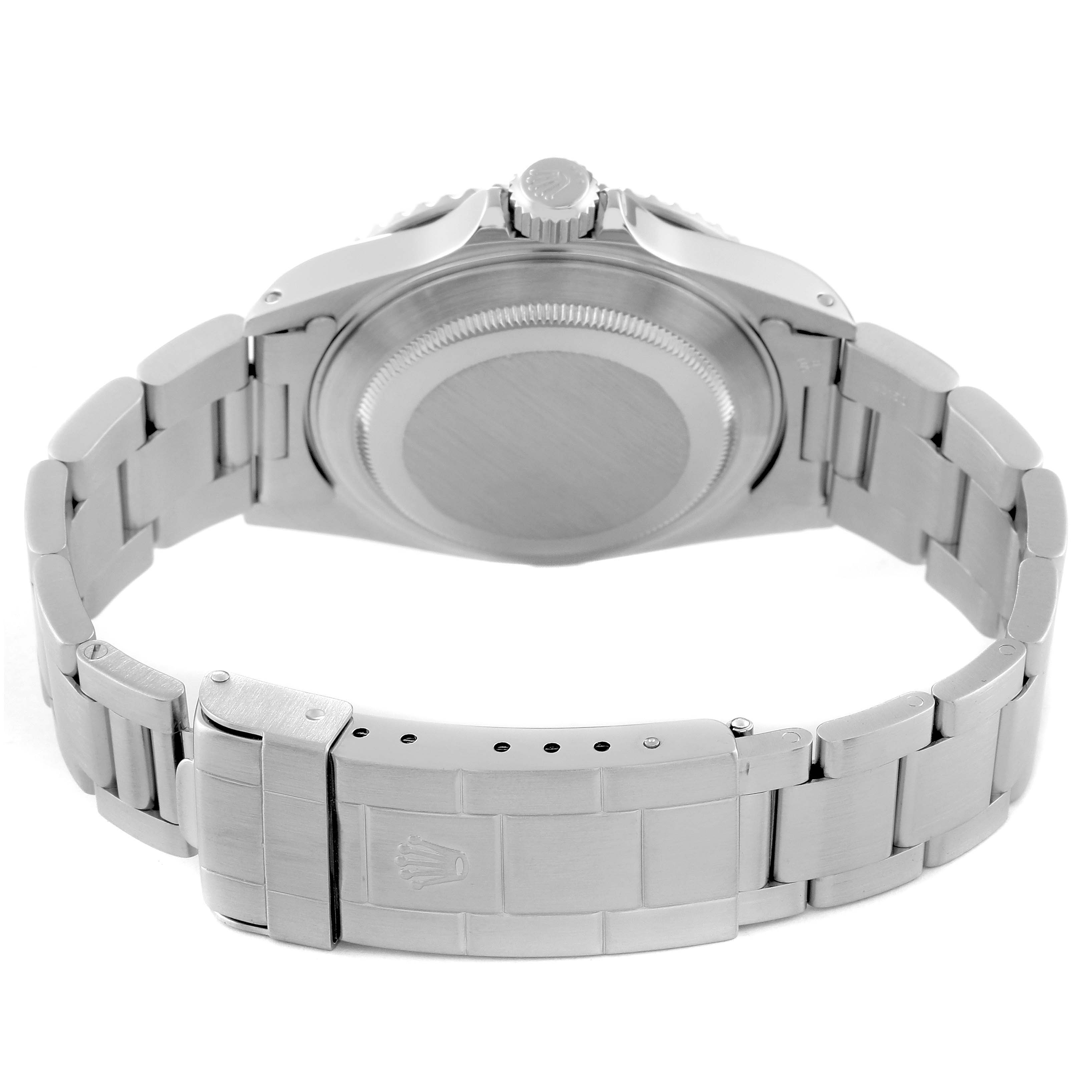 This image shows a rear view of the Rolex Submariner 14060 Men
s Stainless Steel Black Dial 14060 Men
s Stainless Steel Black Dial watch, highlighting its case back, crown, and stainless steel bracelet with clasp.