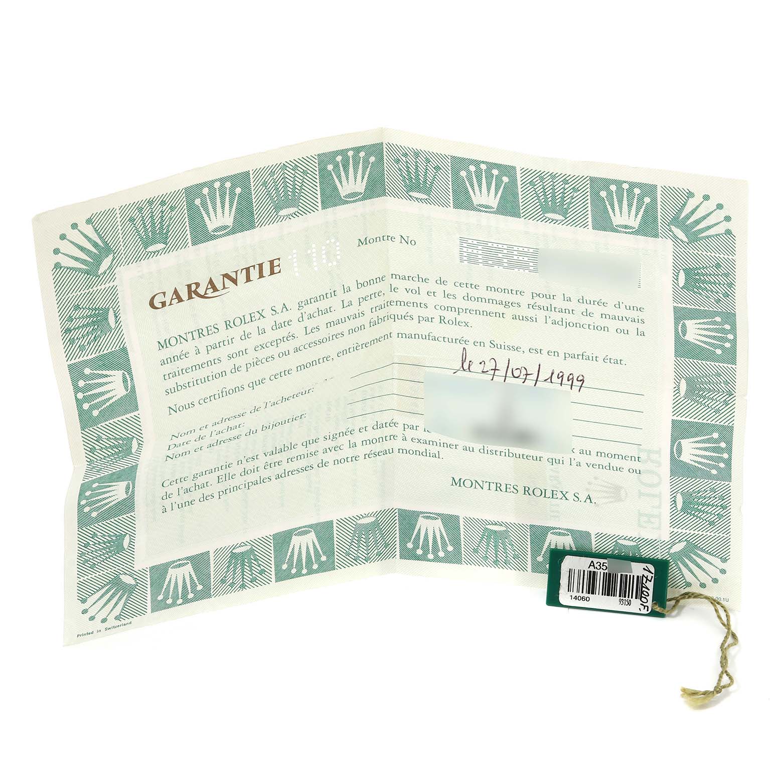 The image shows the guarantee certificate and tag for a Rolex Submariner 14060 Men
s Stainless Steel Black Dial 14060 Men
s Stainless Steel Black Dial watch.