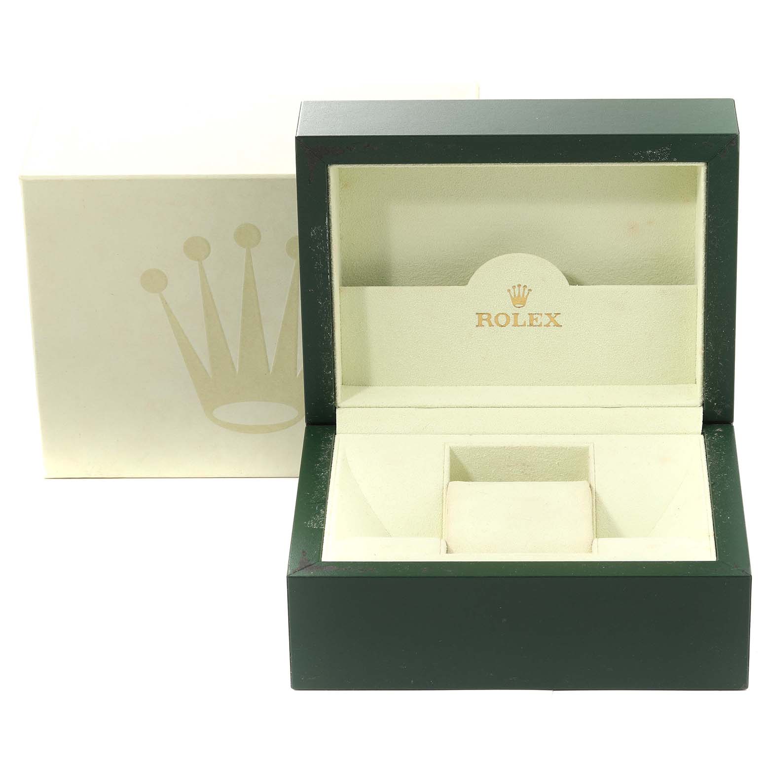 The image shows an open green and beige Rolex box for a Submariner model, with the Rolex logo visible inside.