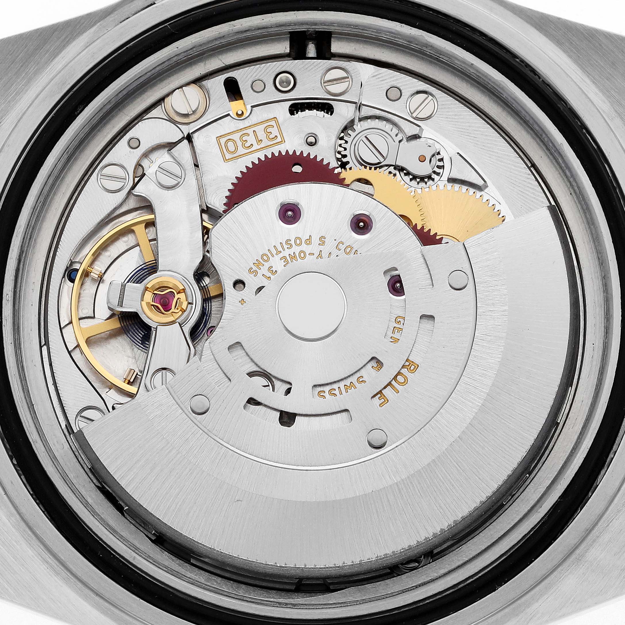 This image shows an internal view of the Rolex Submariner 14060M Men
s Stainless Steel Black Dial 14060M Men
s Stainless Steel Black Dial
s movement mechanism, highlighting gears and components.