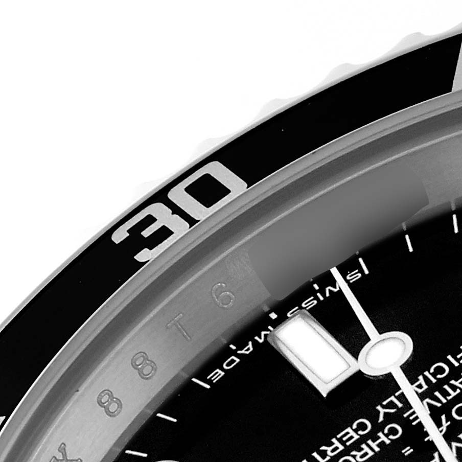 This image shows a close-up angle of the bezel and part of the dial of a Rolex Submariner 14060 Men
s Stainless Steel Black Dial 14060 Men
s Stainless Steel Black Dial watch.