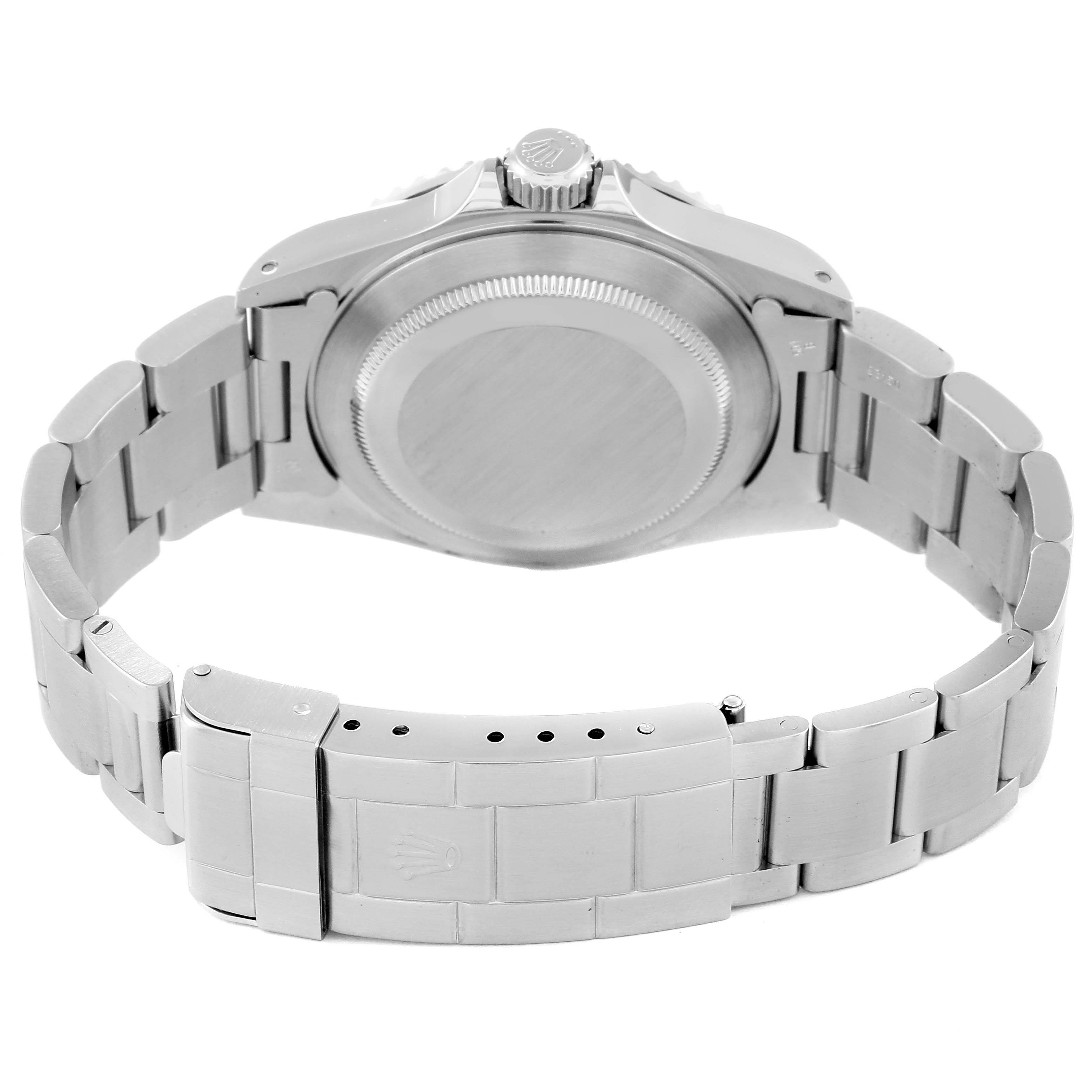 The image shows the backside and bracelet of a Rolex Submariner 14060 Men
s Stainless Steel Black Dial 14060 Men
s Stainless Steel Black Dial watch.