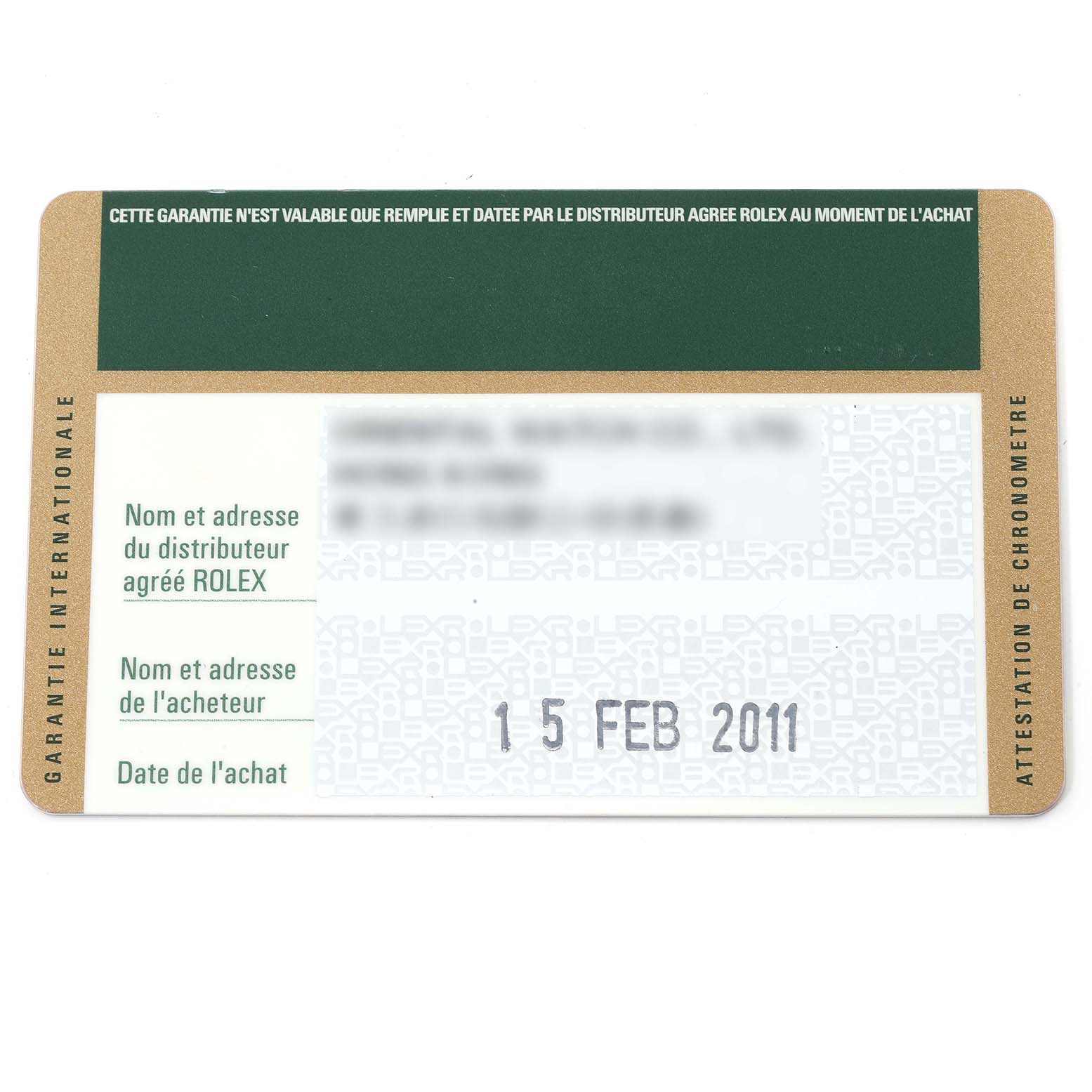 This image shows the warranty card for a Rolex Submariner 14060 Men
s Stainless Steel Black Dial 14060 Men
s Stainless Steel Black Dial watch, featuring purchase date and distributor details.