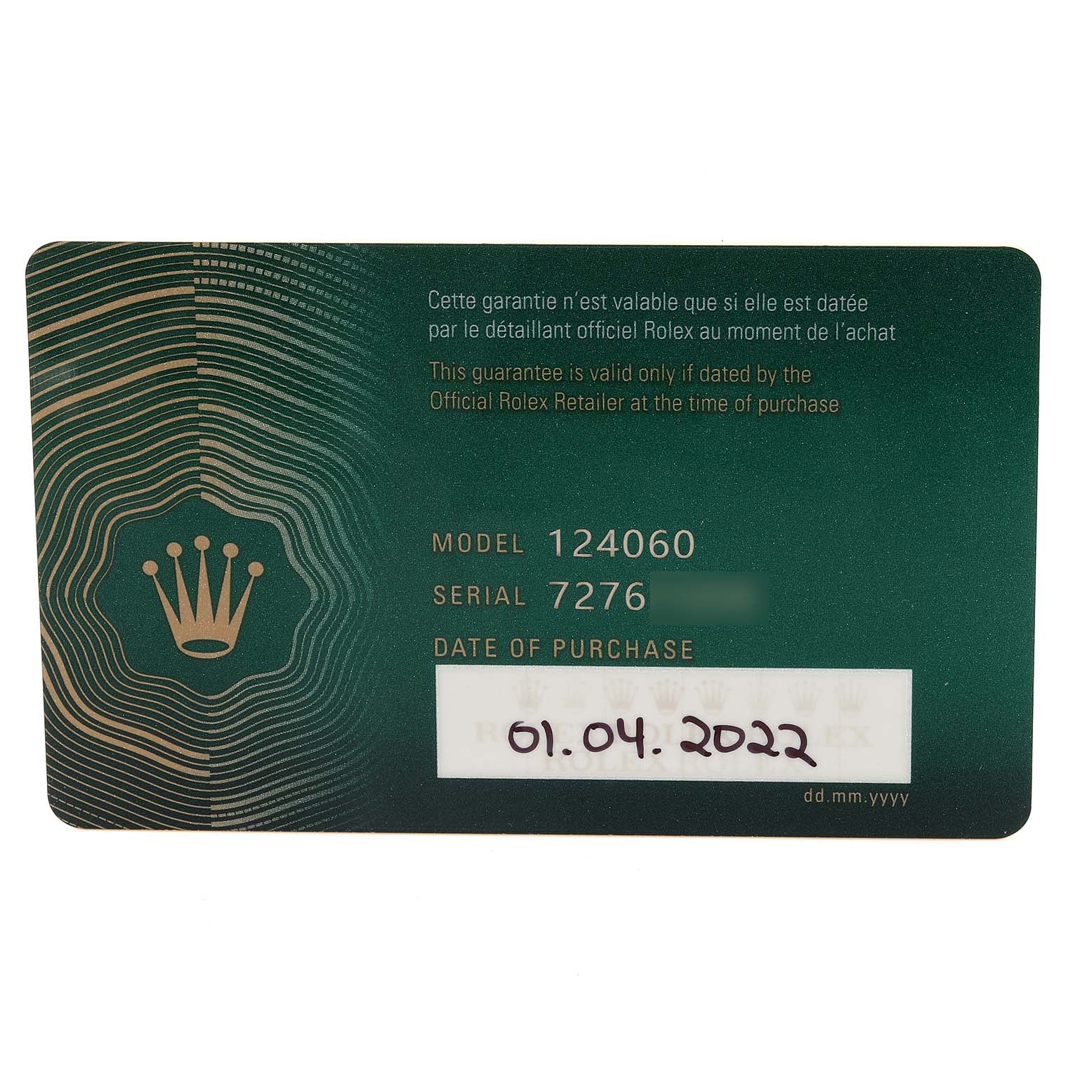 This image shows a Rolex warranty card for the Submariner model 124060, highlighting the model, serial number, and purchase date.