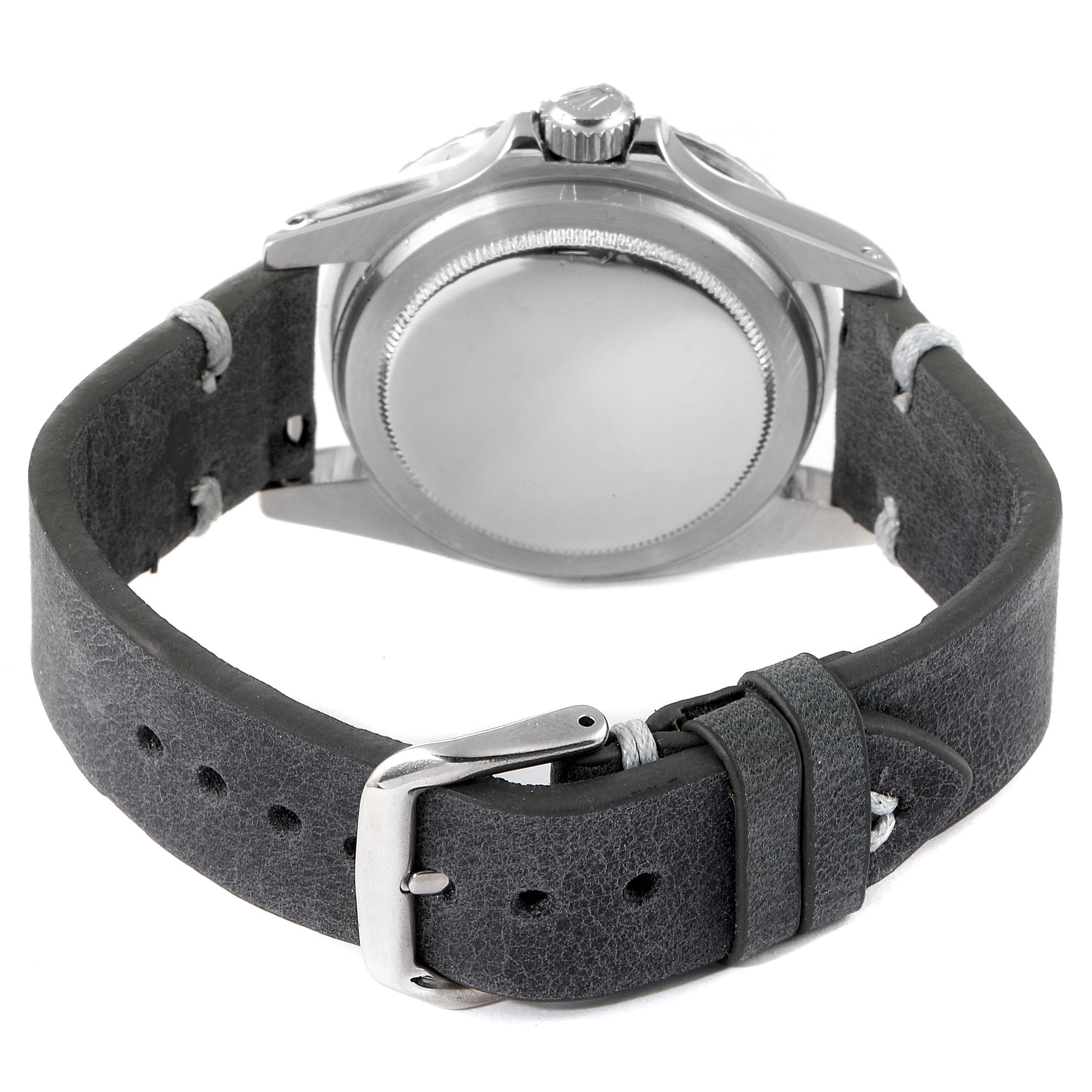 This image shows the back and sides of the Rolex Vintage Collection 1680 Men's Stainless Steel Black Dial 1680 Men's Stainless Steel Black Dial watch, highlighting the strap, buckle, and case back.