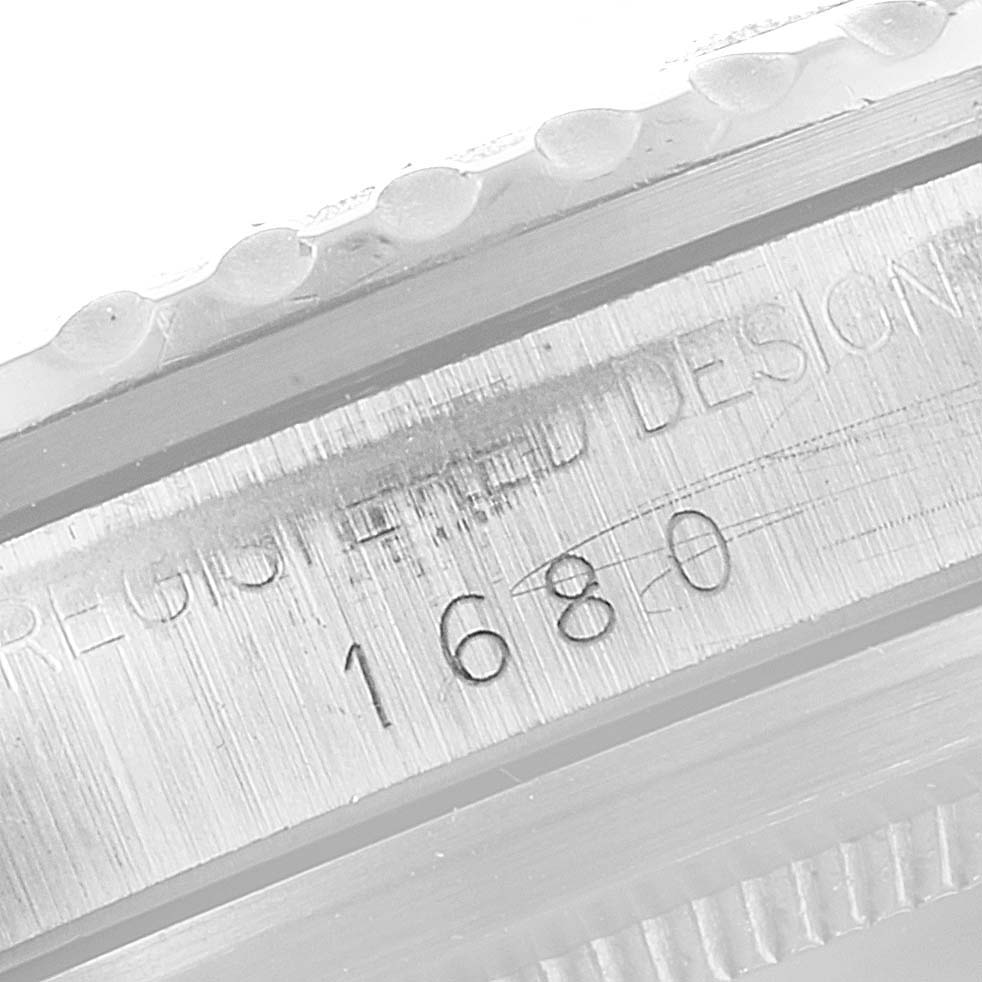 The image shows a close-up of the case back and serial number engravings on a Rolex Vintage Collection 1680 Men's Stainless Steel Black Dial 1680 Men's Stainless Steel Black Dial model 1680.