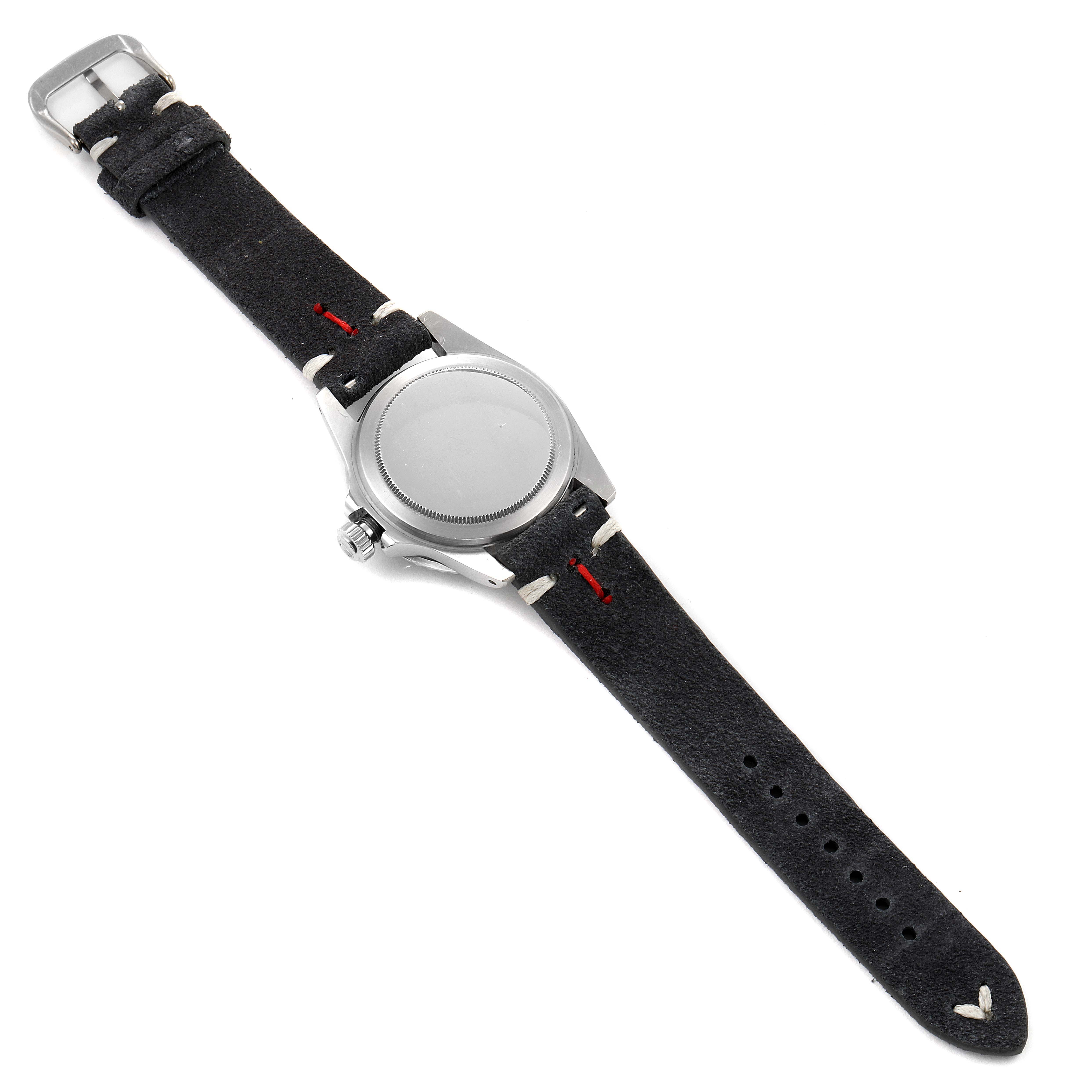 The image shows the back side of a Rolex Vintage Collection 1680 Men's Stainless Steel Black Dial 1680 Men's Stainless Steel Black Dial watch with a black leather strap.