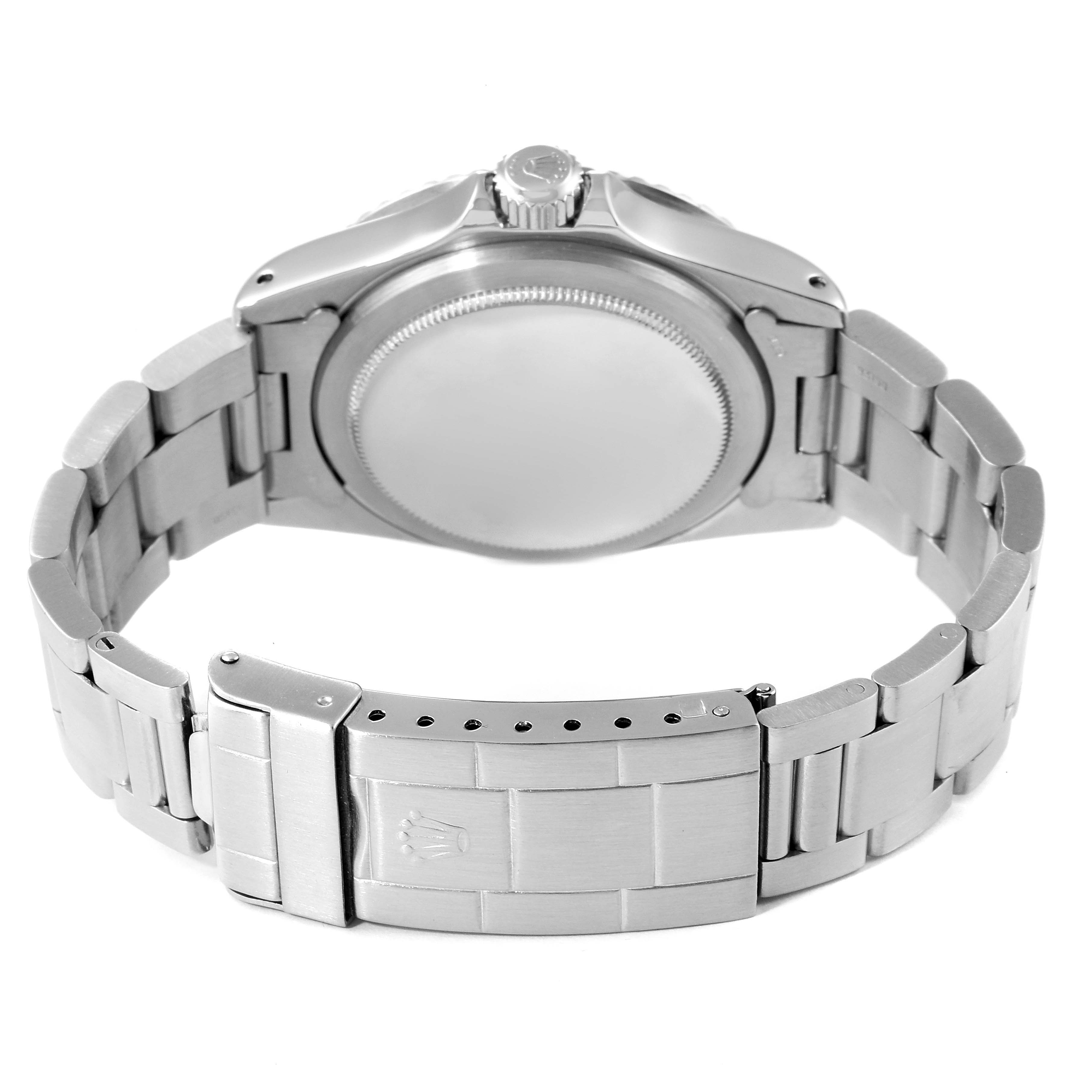 The image shows the back view of a Rolex Vintage Collection 1680 Men's Stainless Steel Black Dial 1680 Men's Stainless Steel Black Dial model watch, highlighting the clasp and bracelet.