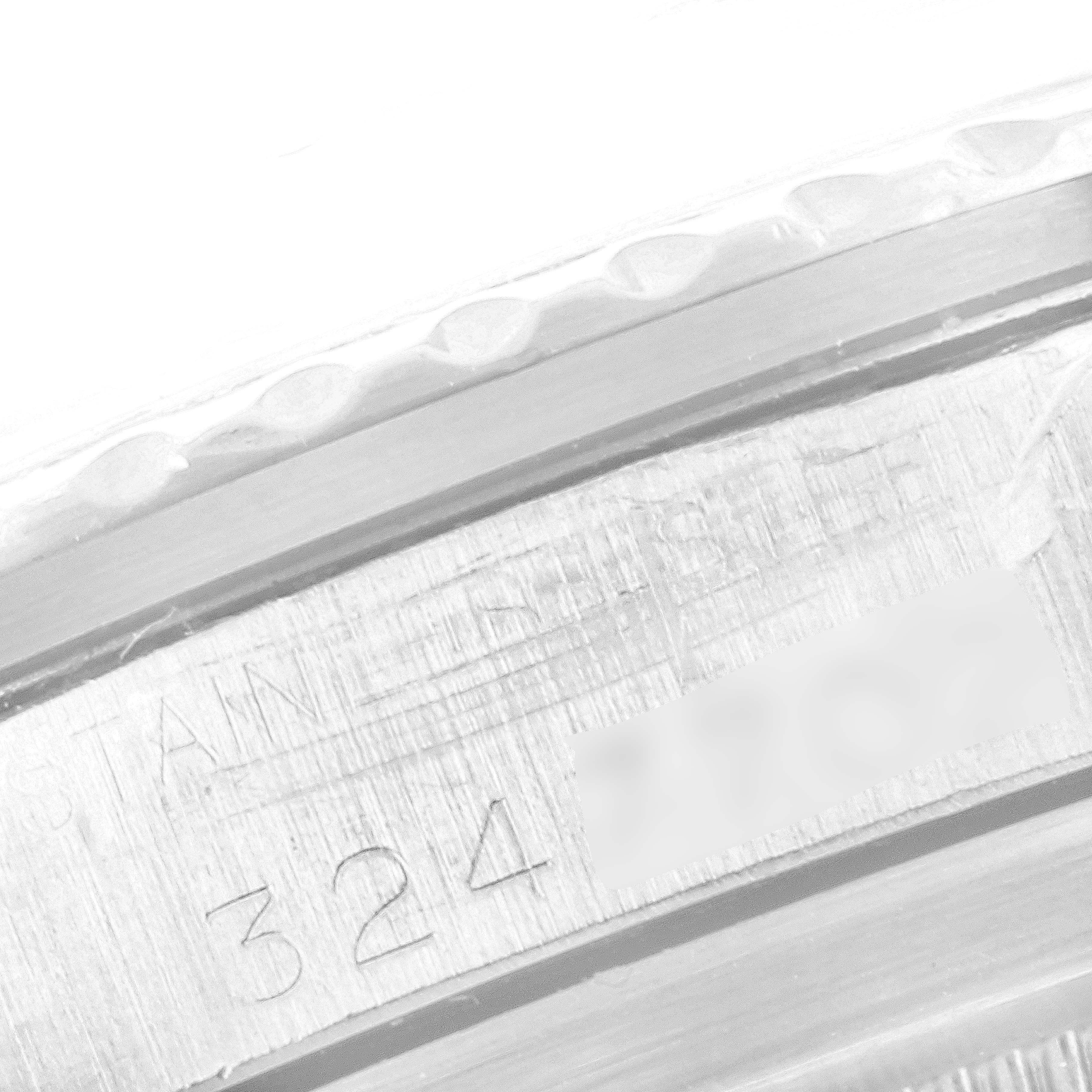 The image shows a close-up of the engraved serial number on the case back of a Rolex Vintage Collection 1680 Men's Stainless Steel Black Dial 1680 Men's Stainless Steel Black Dial model watch.