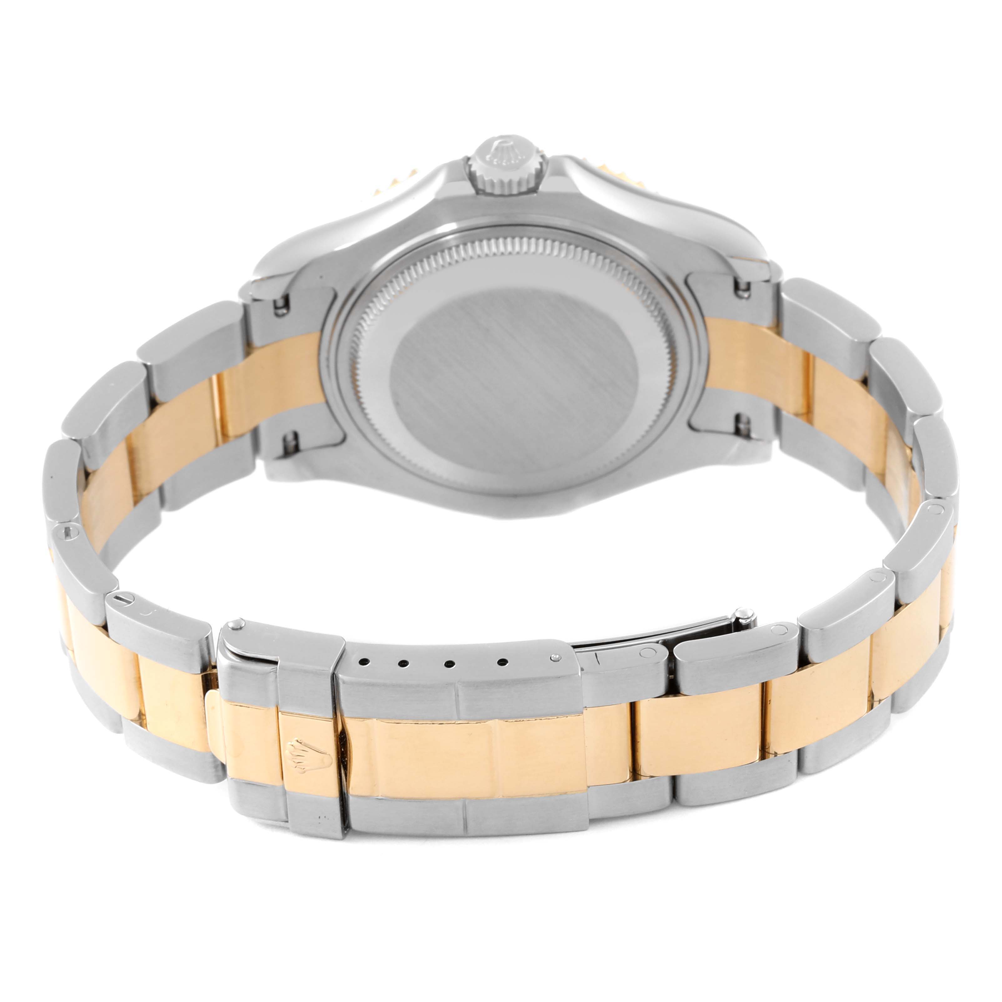 The image shows the back view of a Rolex Yacht-Master 168623 Men's Steel and Gold (two tone) Grey Dial 168623 Men's Steel and Gold (two tone) Grey Dial watch, focusing on its case and two-tone bracelet.