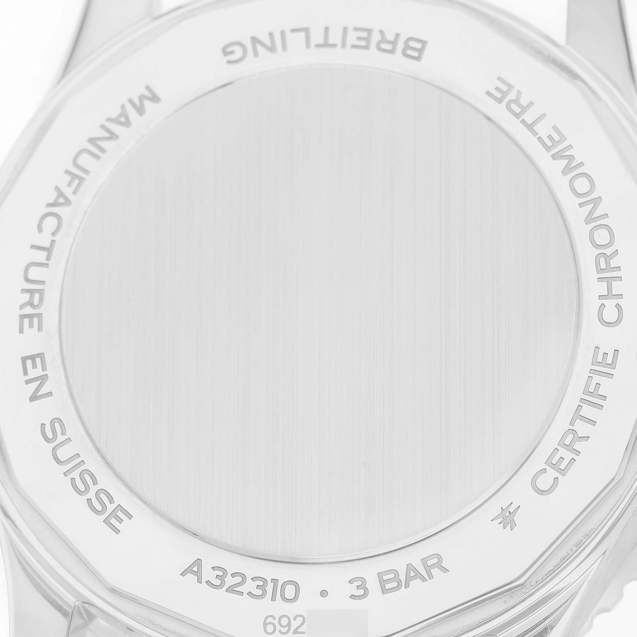 The image shows the back of a Breitling Navitimer A32310 Men's Stainless Steel Blue Dial watch, highlighting its engraved details and brushed finish.