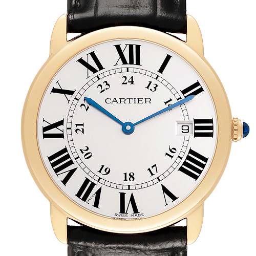 The Cartier Ronde W6700455 Men's Yellow Gold Silver Dial watch is shown from a front angle, highlighting its gold case, Roman numeral dial, blue hands, and black leather strap.