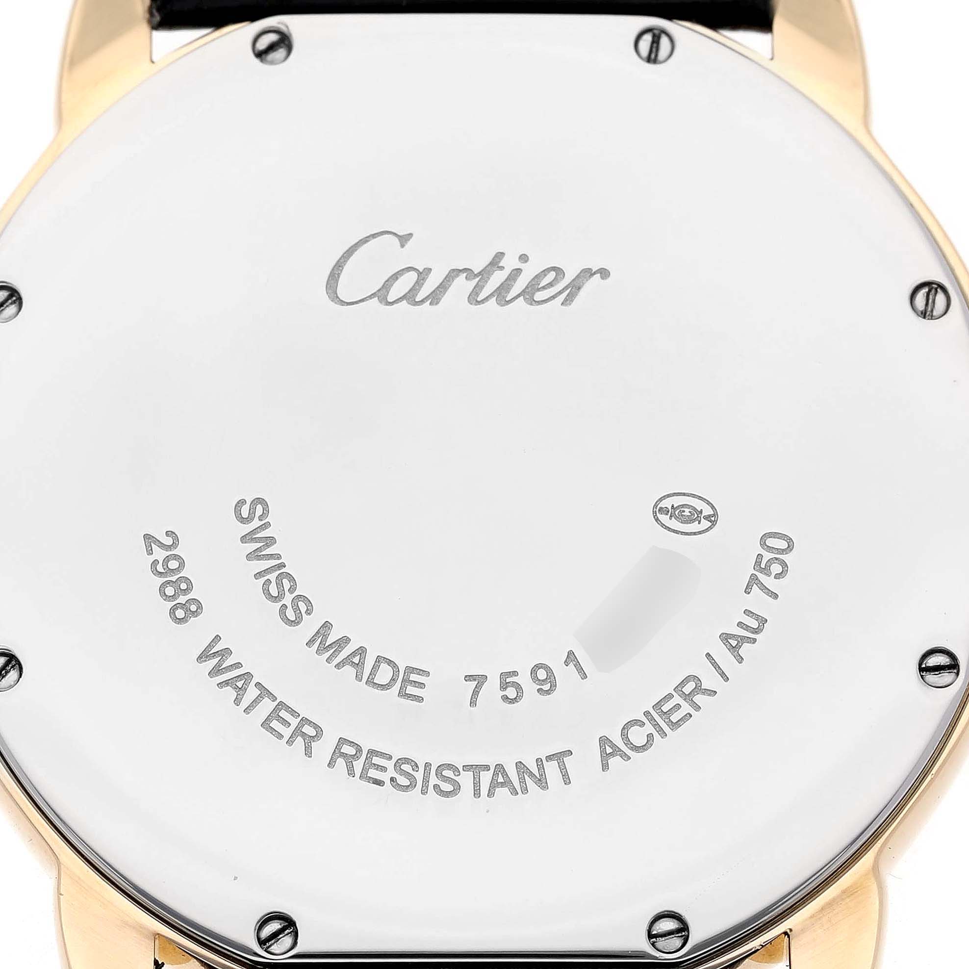 The image shows the back case of a Cartier Ronde W6700455 Men's Yellow Gold Silver Dial watch, highlighting the brand name and specifications.