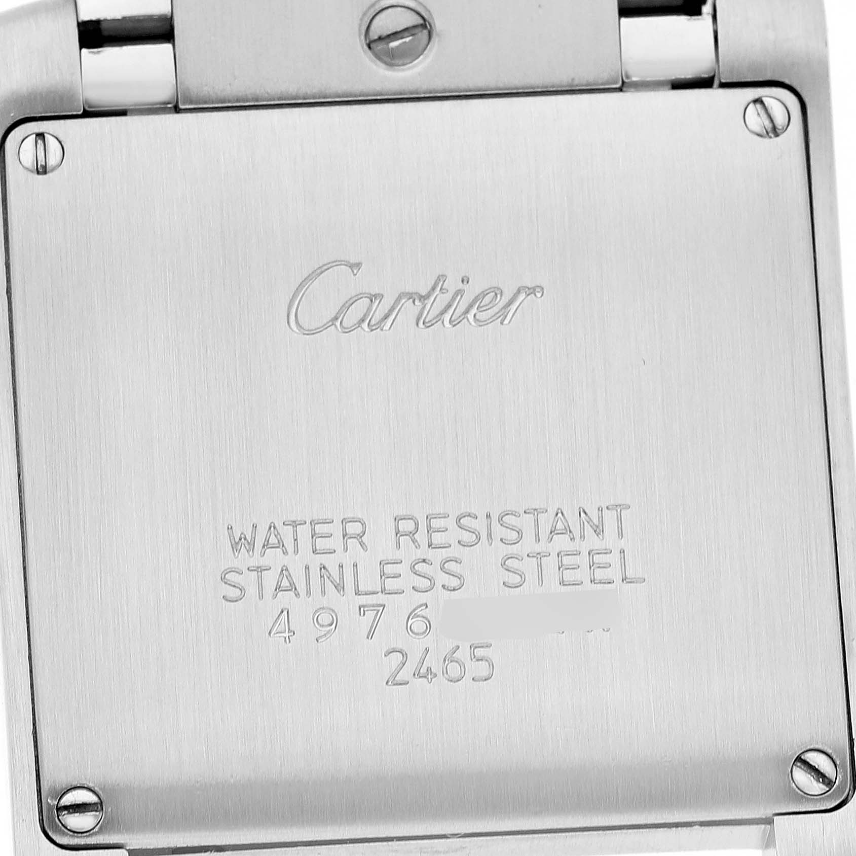 The image shows the back of a Cartier Tank Française watch, highlighting the engraved logo and details about water resistance and material.