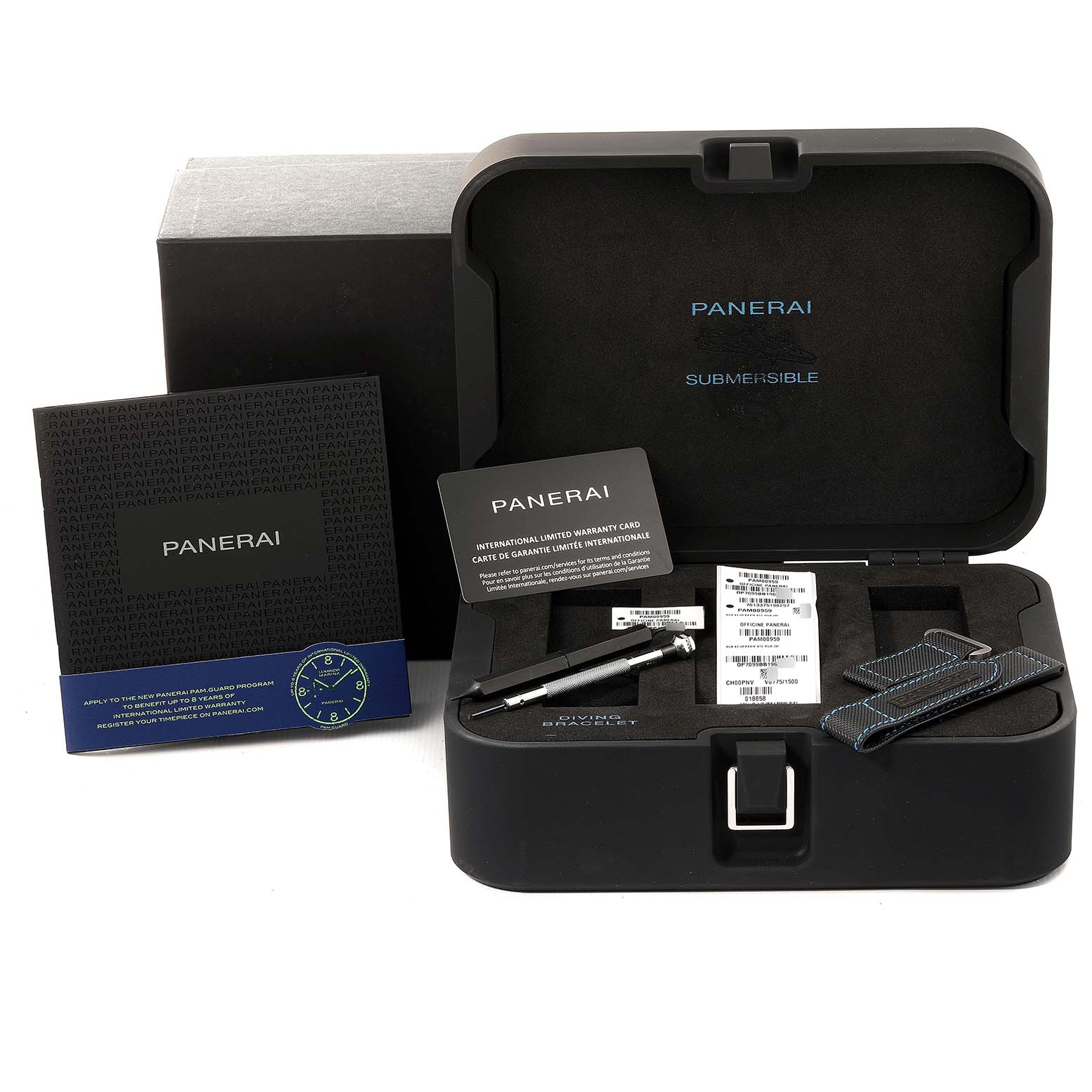 The image shows an open box of a Panerai Submersible PAM00959 Men's Stainless Steel Grey Dial PAM00959 Men's Stainless Steel Grey Dial watch with accessories, warranty cards, and documentation.