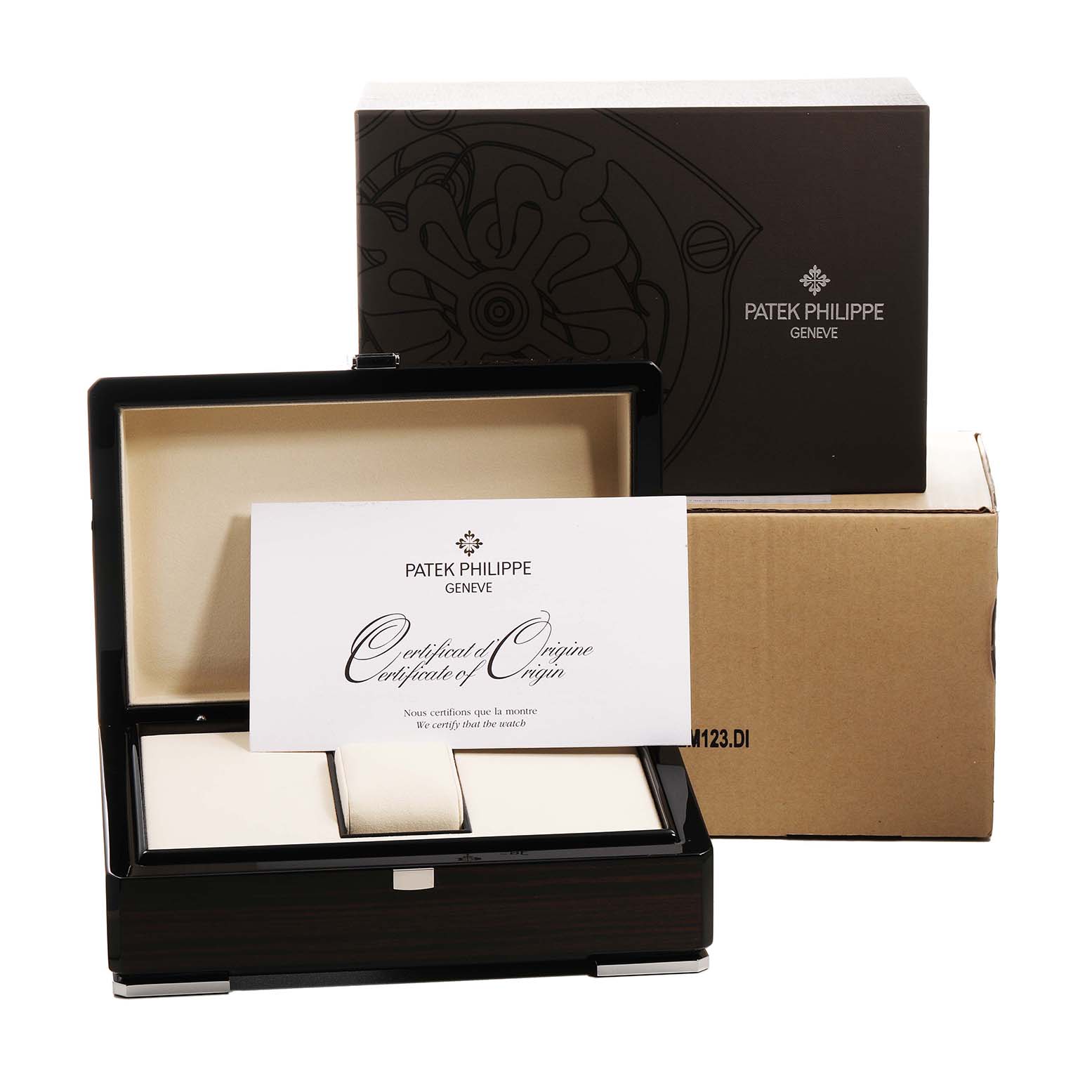 The image shows the packaging and certificate for a Patek Philippe Aquanaut 5087/1A-001 Women's Stainless Steel Black Dial, including a box and papers, at eye level.