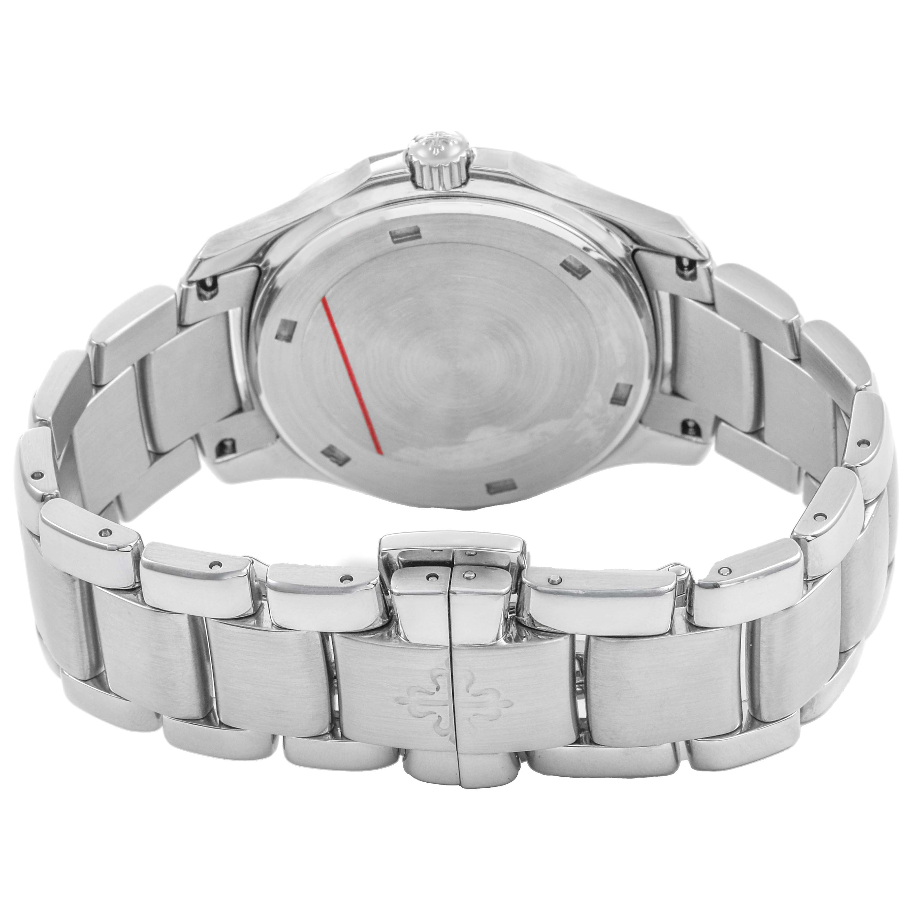 The image shows the back of a Patek Philippe Aquanaut 5087/1A-001 Women's Stainless Steel Black Dial watch, focusing on the stainless steel case and bracelet.