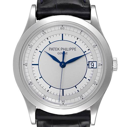 The Patek Philippe Calatrava watch is shown from a front angle, displaying the entire face and part of the strap.