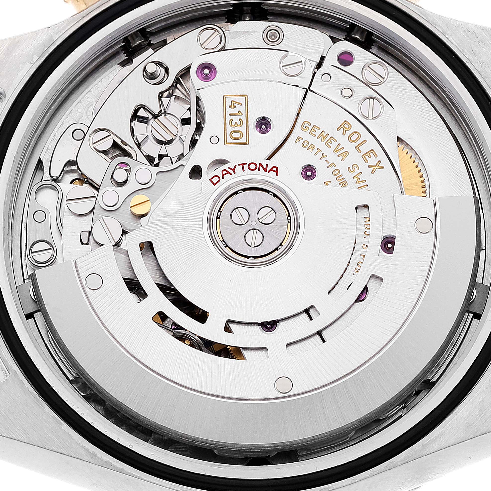 This image shows the intricate internal movement of a Rolex Daytona 116503 Men's Steel and Gold (two tone) Black Dial 116503 Men's Steel and Gold (two tone) Black Dial watch, highlighting the rotor and various gears.