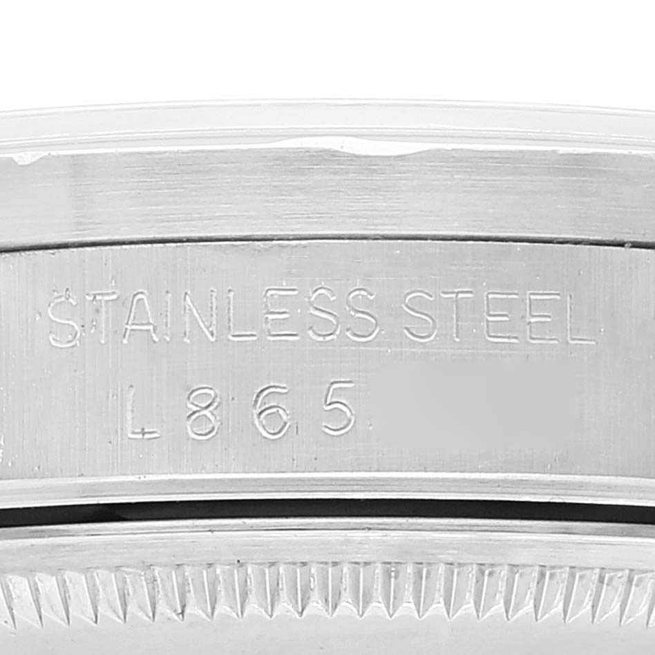 This image shows a close-up of the stainless steel case and model engraving of a Rolex Date 15210 Men
s Stainless Steel Silver Dial 15210 Men
s Stainless Steel Silver Dial watch.