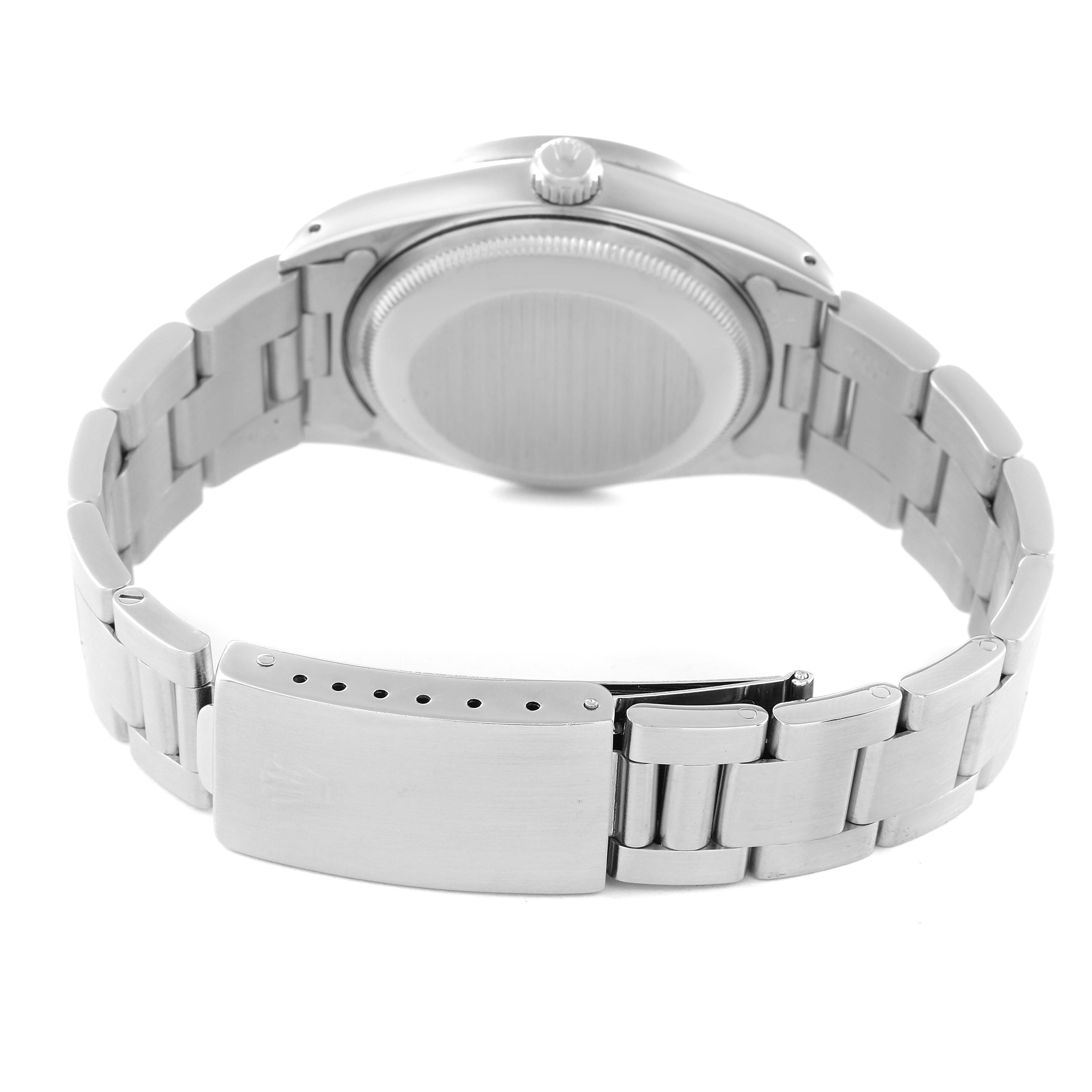 The image shows the back and band of a Rolex Date 15210 Men
s Stainless Steel Silver Dial 15210 Men
s Stainless Steel Silver Dial model watch, emphasizing the clasp and case back.