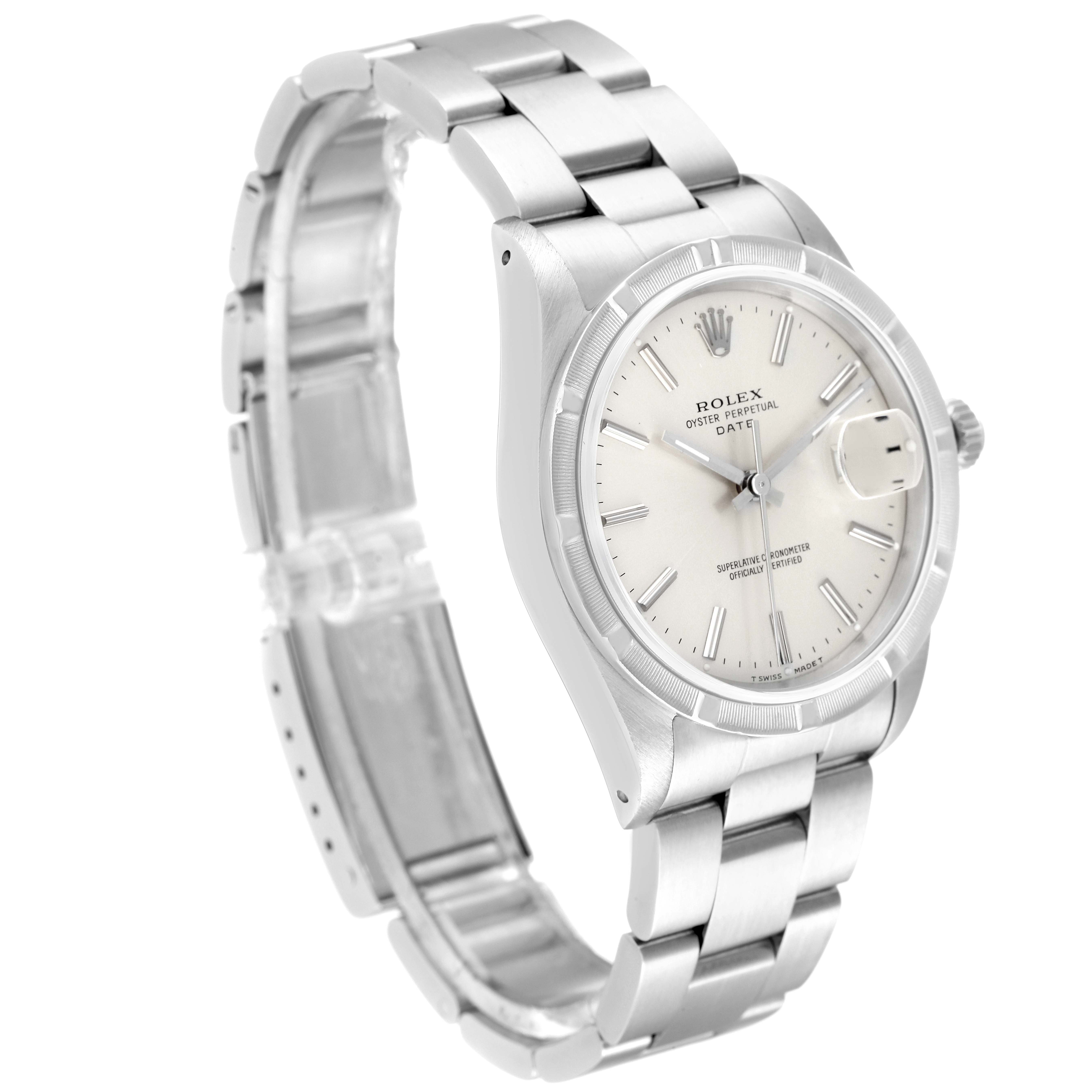 The image shows a Rolex Date 15210 Men
s Stainless Steel Silver Dial 15210 Men
s Stainless Steel Silver Dial model watch at an angle highlighting the face, bezel, crown, and metal bracelet.