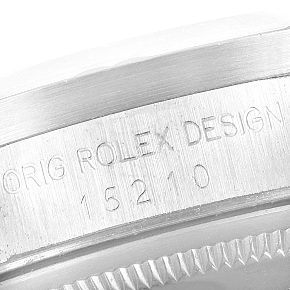 This image shows a close-up of the case side engraving with "ORIG ROLEX DESIGN" on a Rolex Date 15210 Men
s Stainless Steel Silver Dial 15210 Men
s Stainless Steel Silver Dial model watch.