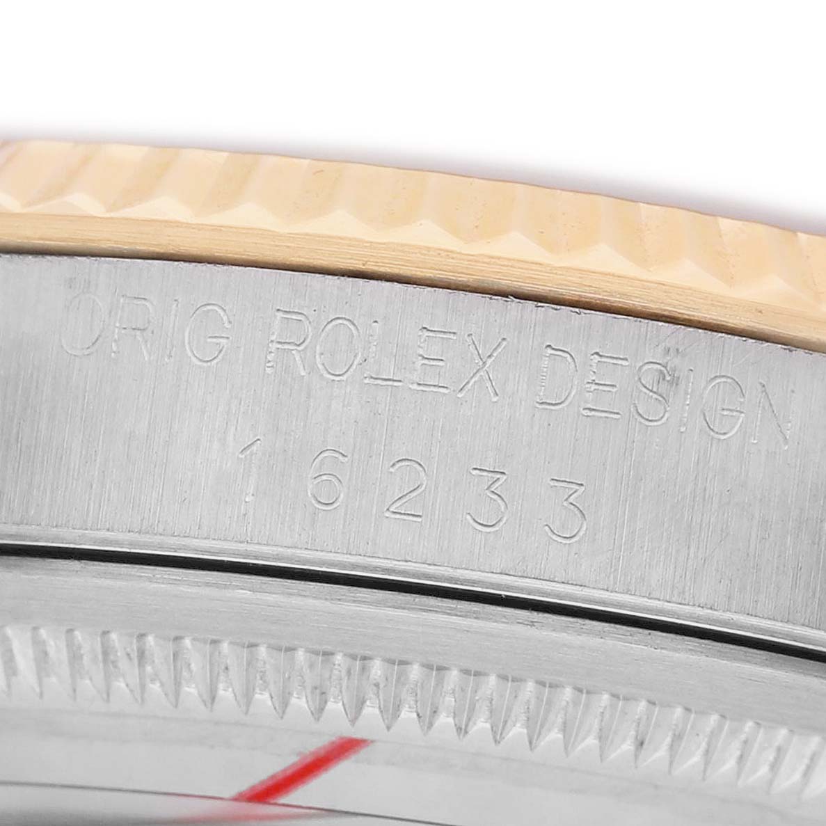 The image shows a close-up of the side of a Rolex Datejust 16233 Men's Steel and Gold (two tone) Silver Dial, highlighting the engraved model number and part of the bezel.