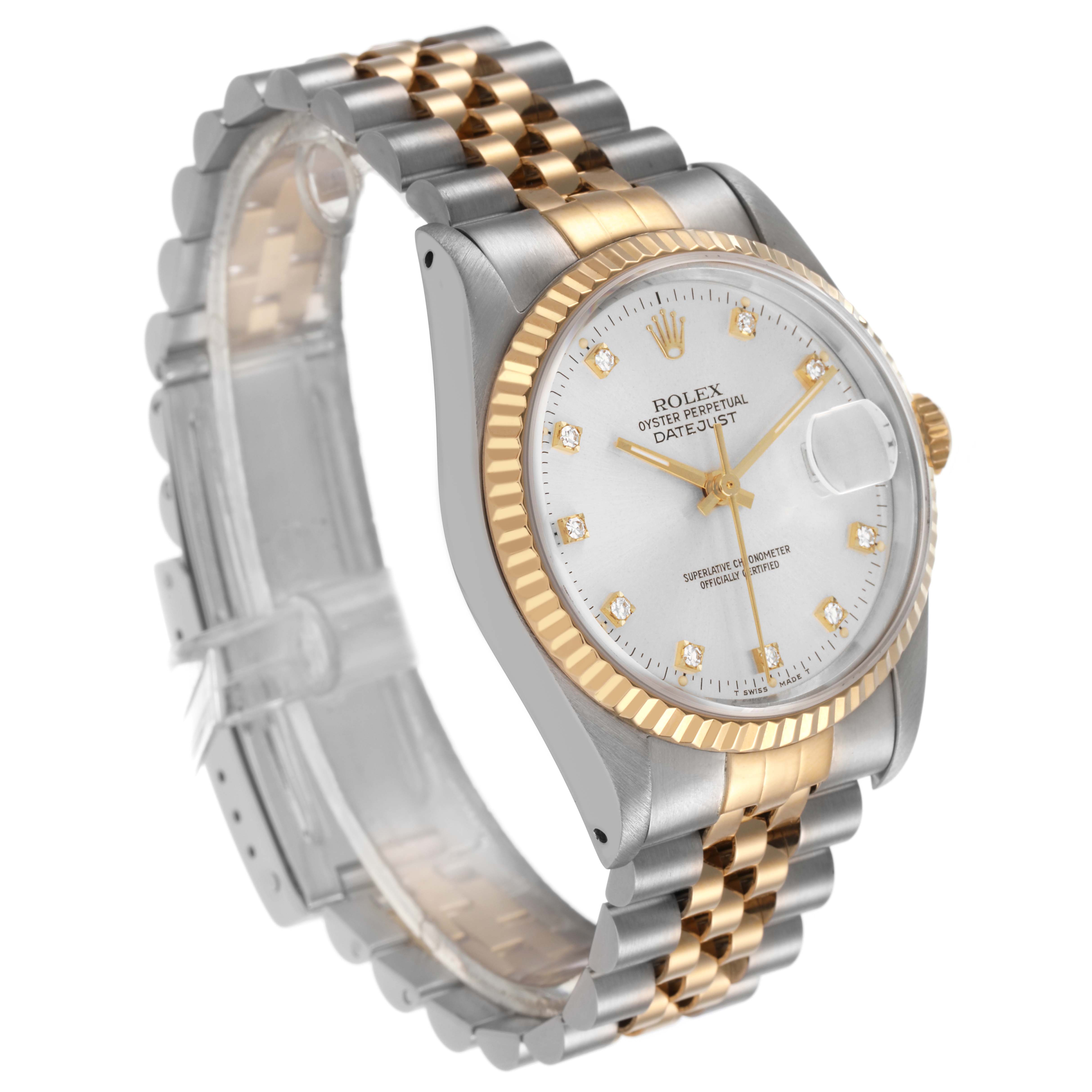 The Rolex Datejust 16233 Men's Steel and Gold (two tone) Silver Dial watch is shown at an angled side view, highlighting its two-tone bracelet and fluted bezel.
