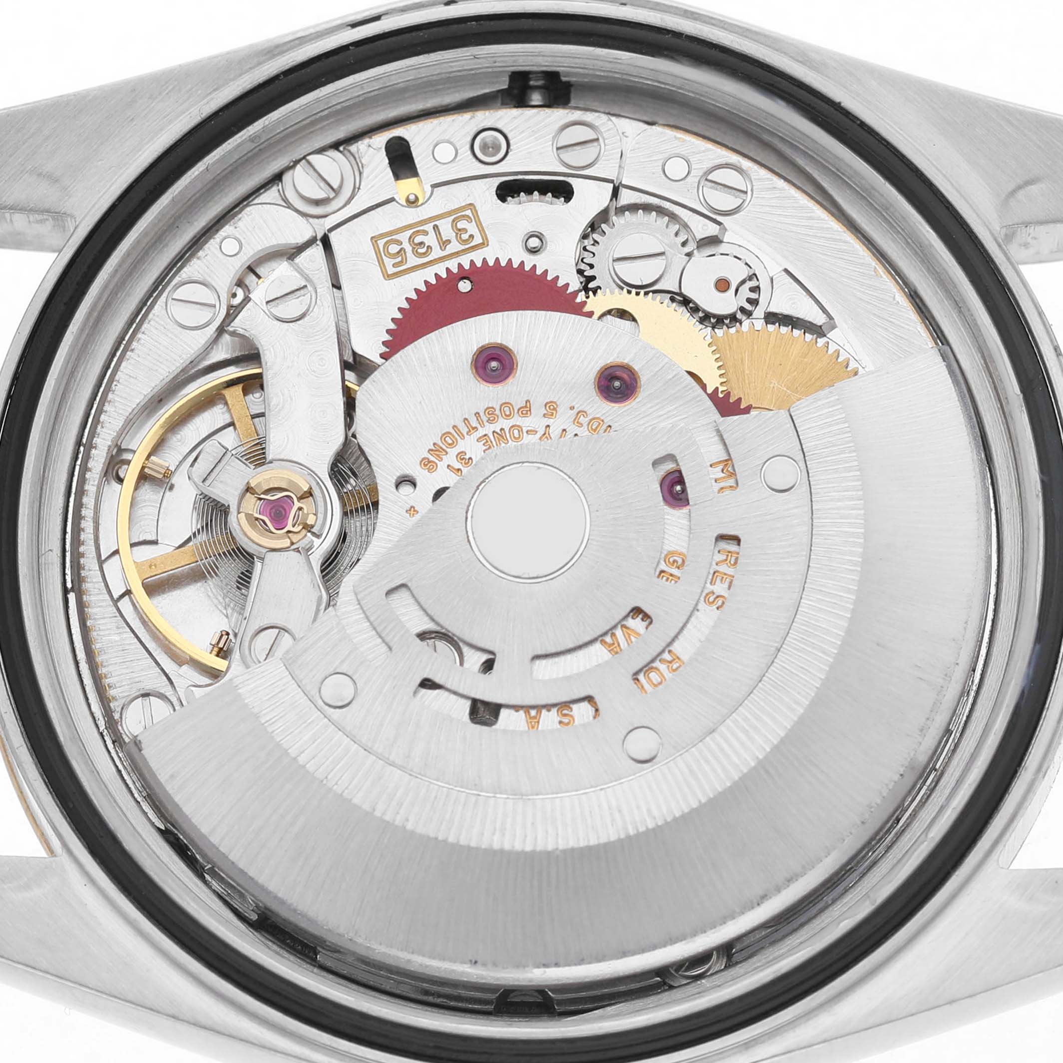 The image shows the movement of a Rolex Datejust 16233 Men's Steel and Gold (two tone) Silver Dial watch from a rear angle, featuring gears and components.