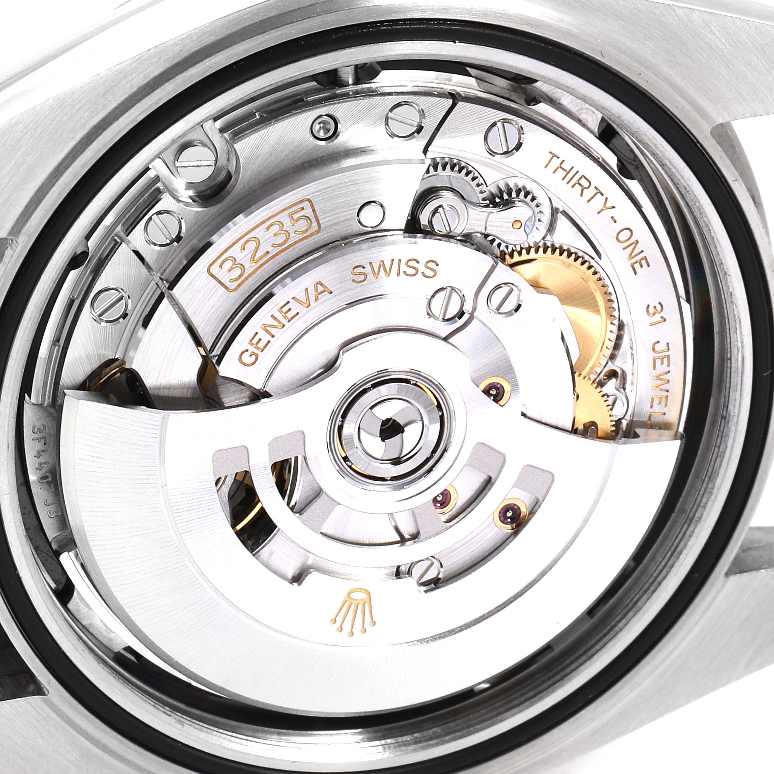 This Rolex Datejust 126334 Men
s Stainless Steel Black Dial 126334 Men
s Stainless Steel Black Dial image shows the watch
s movement from a back angle, highlighting the 3235 mechanism and Geneva Swiss engraving.