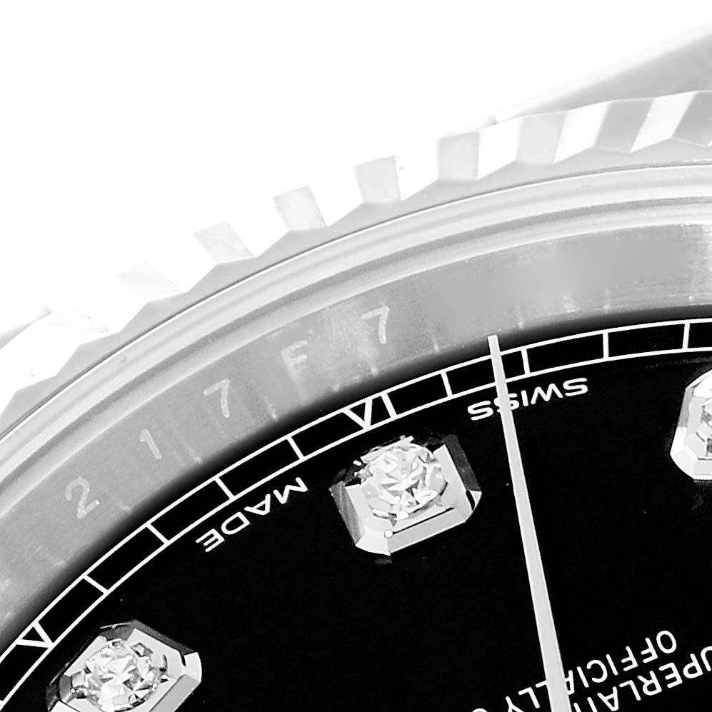 This image shows a close-up of the bezel, edge of the dial, and diamond hour markers of the Rolex Datejust 41 126334 Men's Stainless Steel Black Dial 126334 Men's Stainless Steel Black Dial watch.