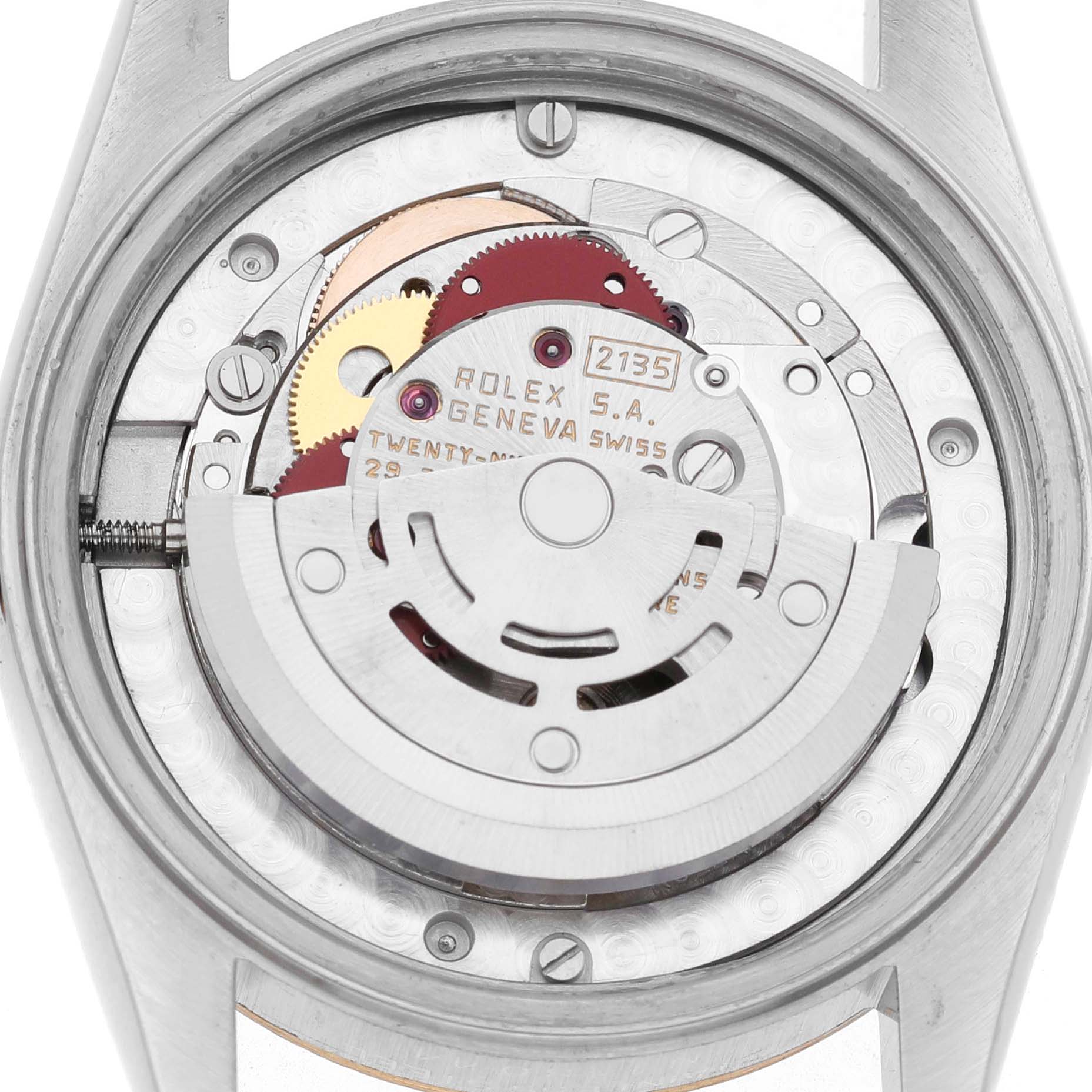 The image shows the back view of a Rolex Mid-Size 68273 Women's Steel and Gold (two tone) White Dial watch, highlighting the internal movement mechanism.