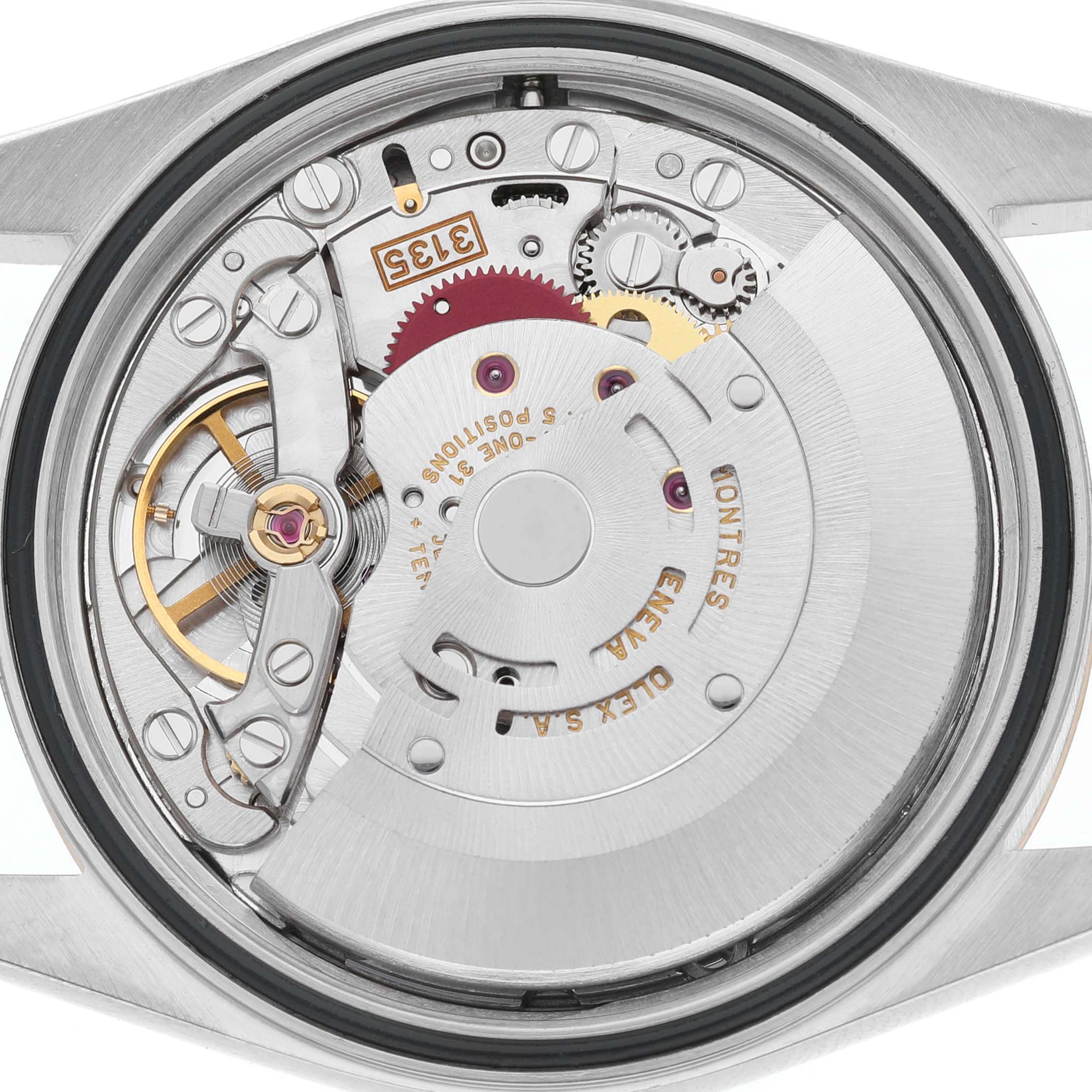The image shows the back view of a Rolex Datejust 16203 Men's Steel and Gold (two tone) Silver Dial, highlighting its mechanical movement and components.