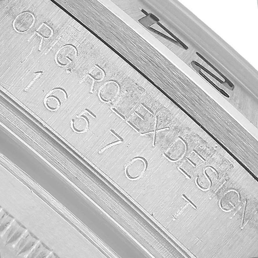 The image shows a close-up of the engraving inside the case of a Rolex Explorer 16570 Men's Stainless Steel White Dial watch.