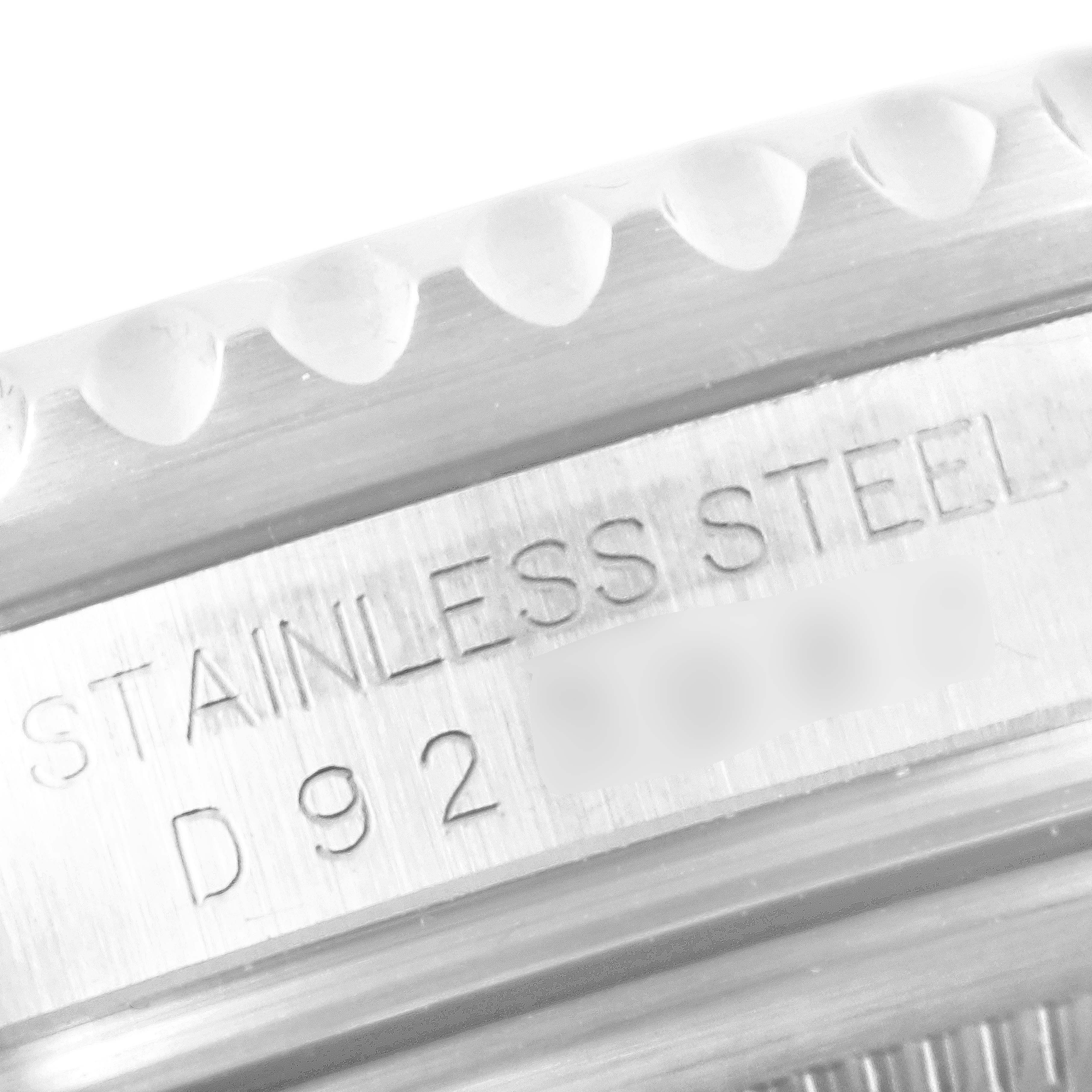 This is a close-up of the case side of the Rolex GMT-Master 16710 Men
s Stainless Steel Black Dial 16710 Men
s Stainless Steel Black Dial watch, showing the engraved text "STAINLESS STEEL."