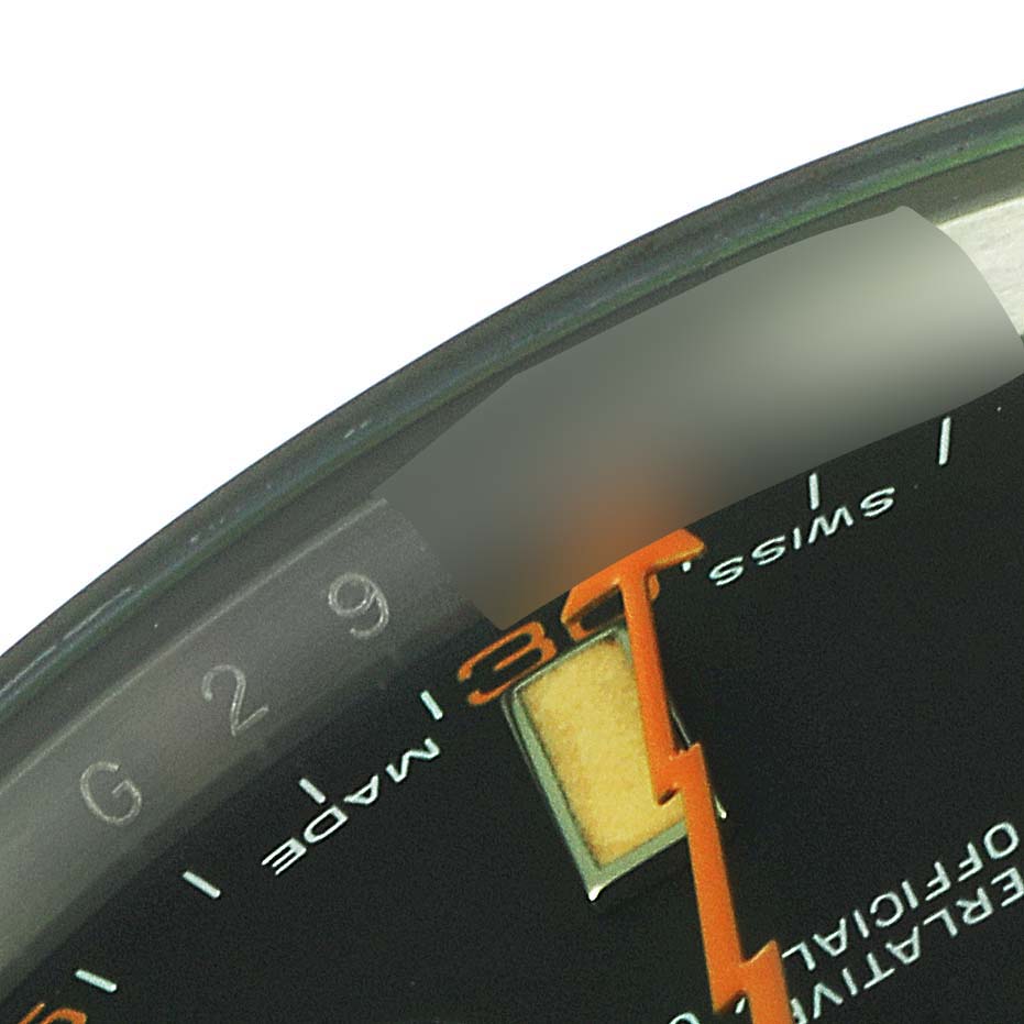 This close-up image shows part of the face and the second hand of a Rolex Milgauss 116400GV Men's Stainless Steel Black Dial 116400GV Men's Stainless Steel Black Dial watch from an oblique angle.