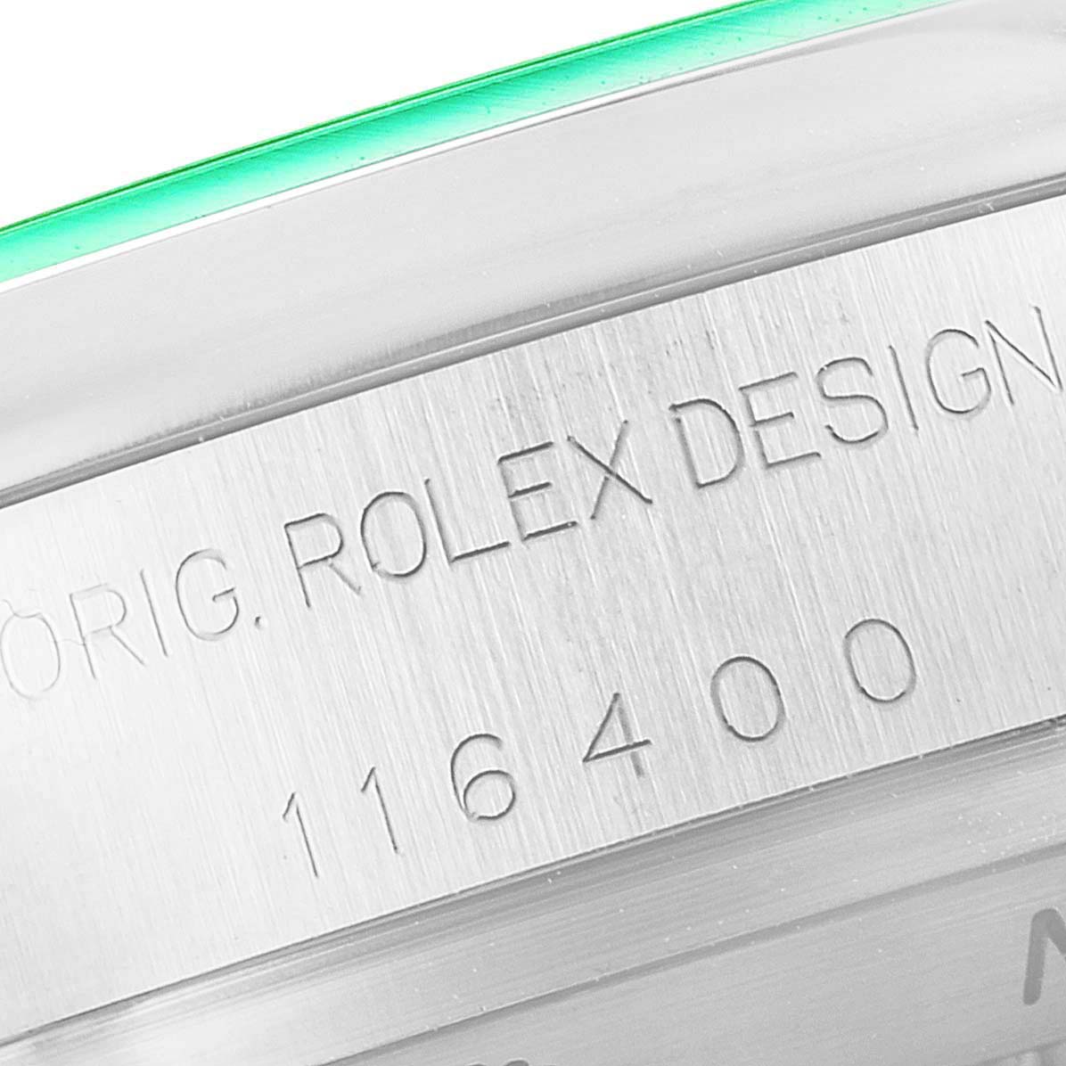 This image shows a close-up of the engraved serial number "116400" and "ROLEX DESIGN" on the side of a Rolex Milgauss 116400GV Men's Stainless Steel Black Dial 116400GV Men's Stainless Steel Black Dial watch case.