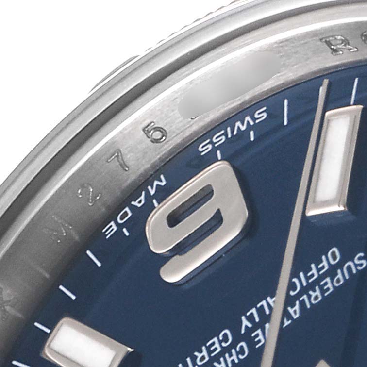 This close-up shows the dial, bezel, and part of the case of a Rolex Oyster Perpetual 176210 Women
s Stainless Steel Blue Dial 176210 Women
s Stainless Steel Blue Dial watch.