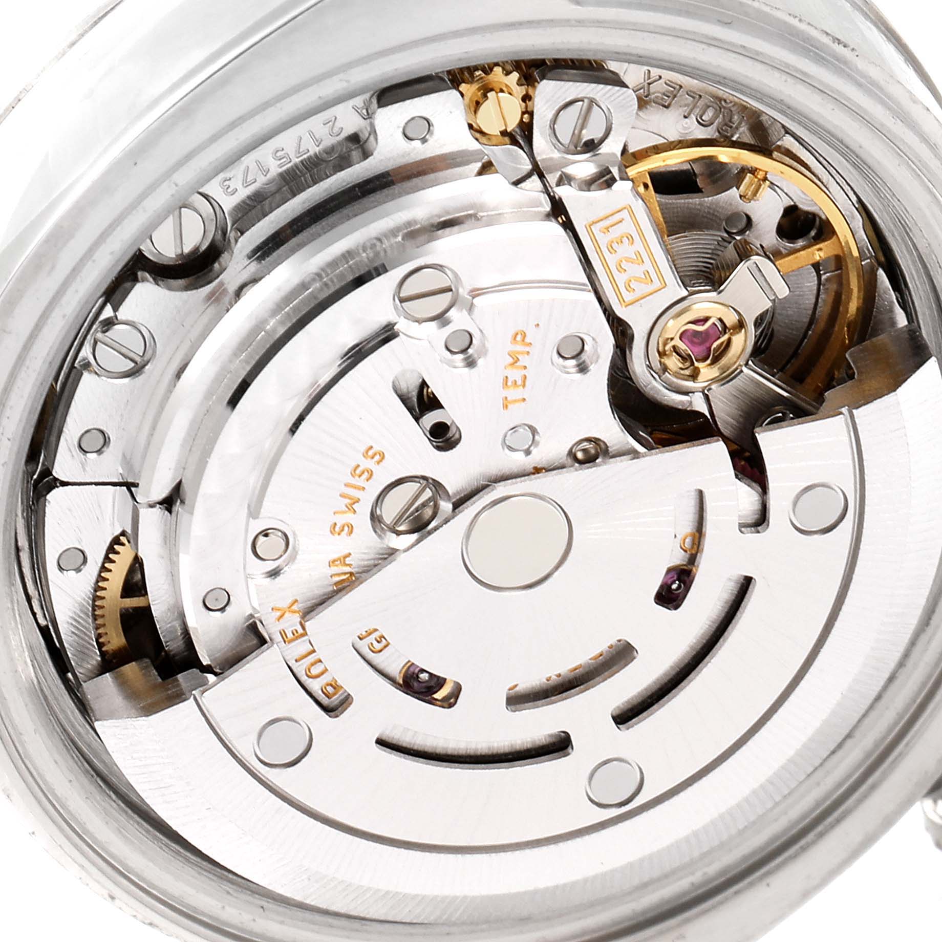 The image shows a close-up of the movement mechanism of a Rolex Oyster Perpetual 176210 Women
s Stainless Steel Blue Dial 176210 Women
s Stainless Steel Blue Dial watch.