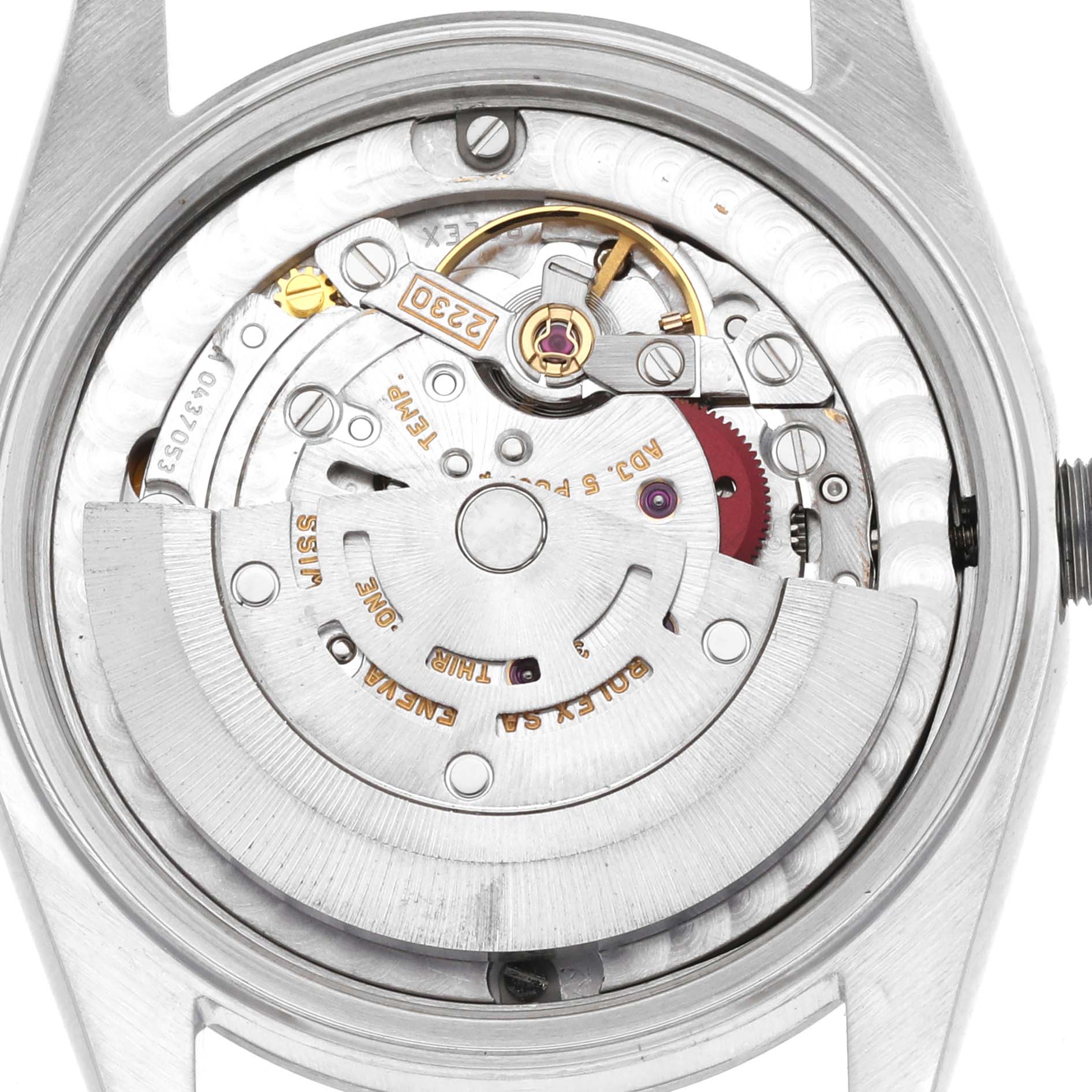 This is a close-up of the back of a Rolex Mid-Size 77080 Women's Stainless Steel Blue Dial 77080 Women's Stainless Steel Blue Dial watch, showing the intricate inner mechanisms and movement parts.